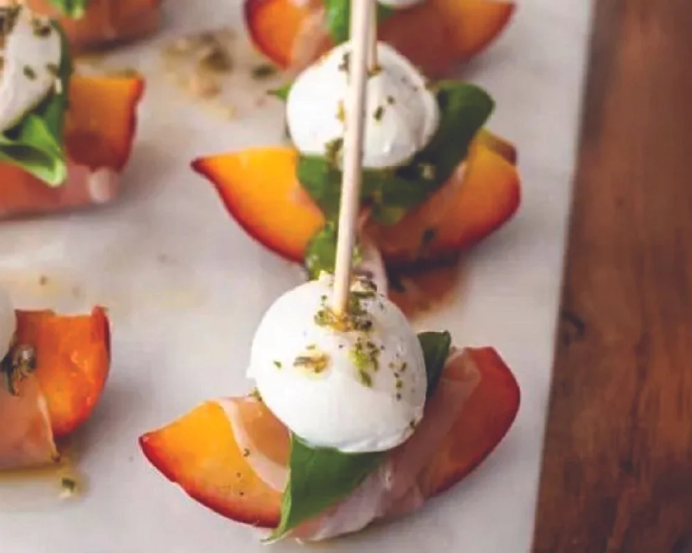 prosciutto wrapped peaches with basil and mozzarella
