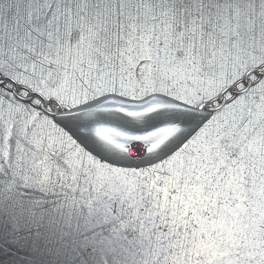 Silver Lips w Ruby Pendant