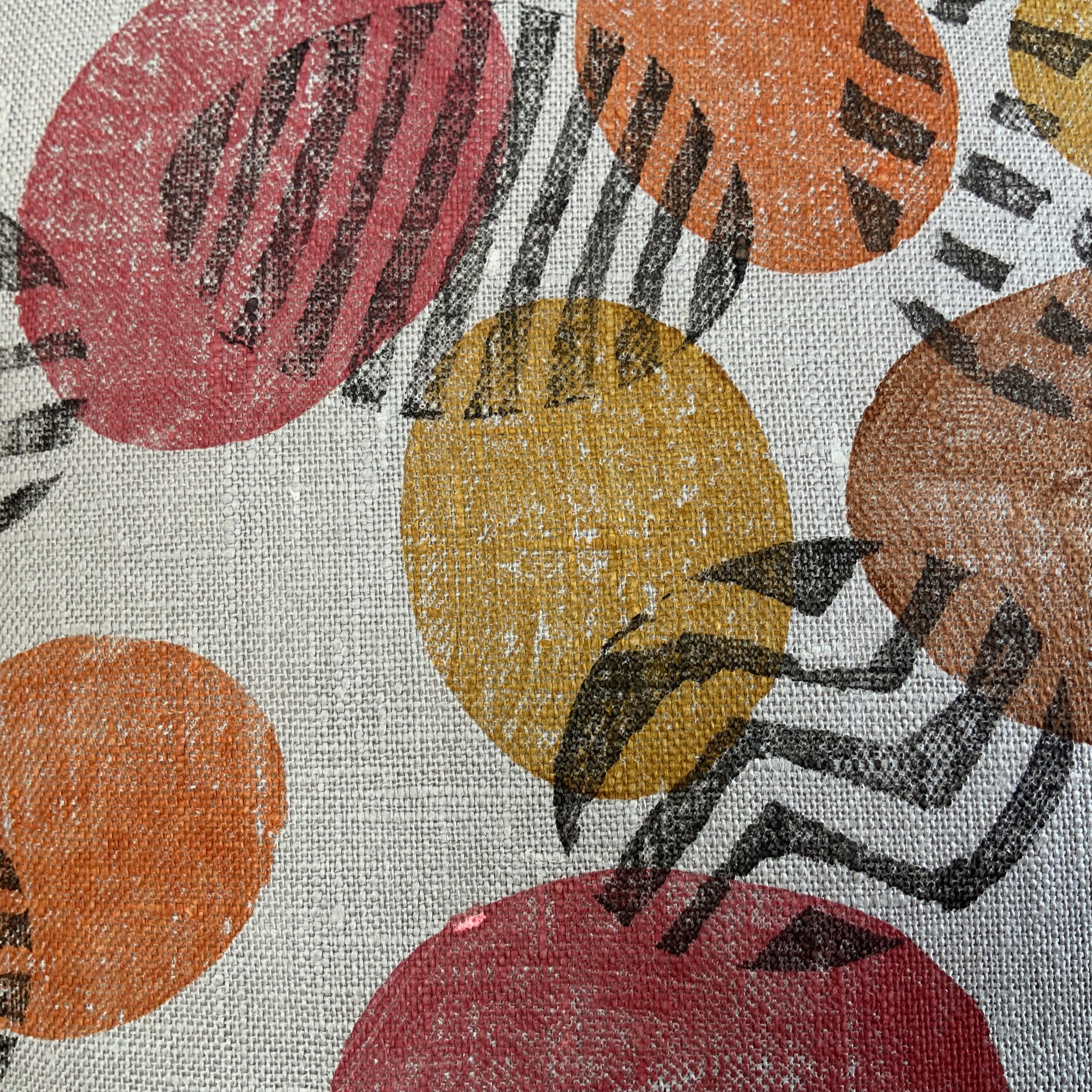 Potato print in black patterns with yellow spots on 100%grey linen. Detail.