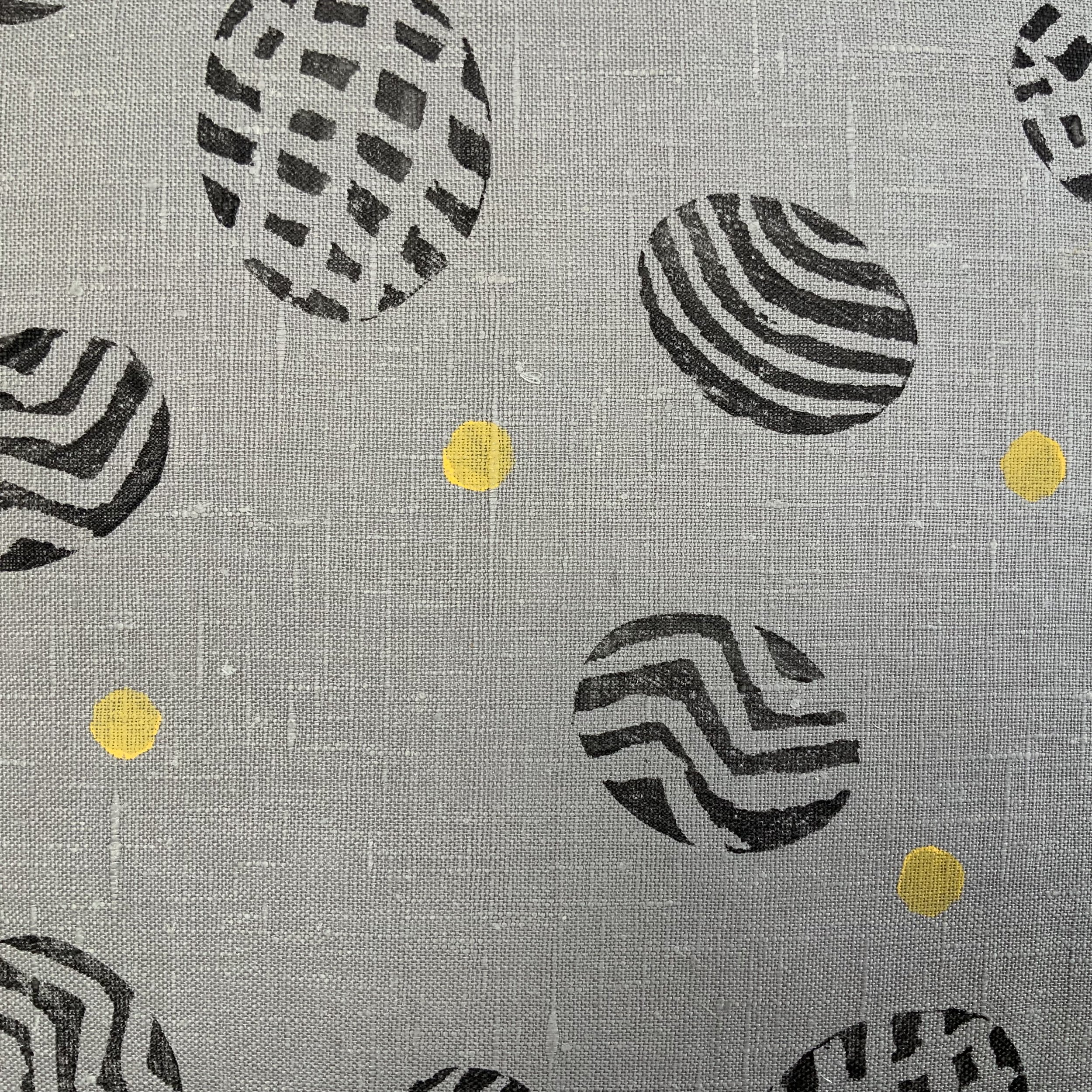 Potato print in black patterns with yellow spots on 100%grey linen.. Detail