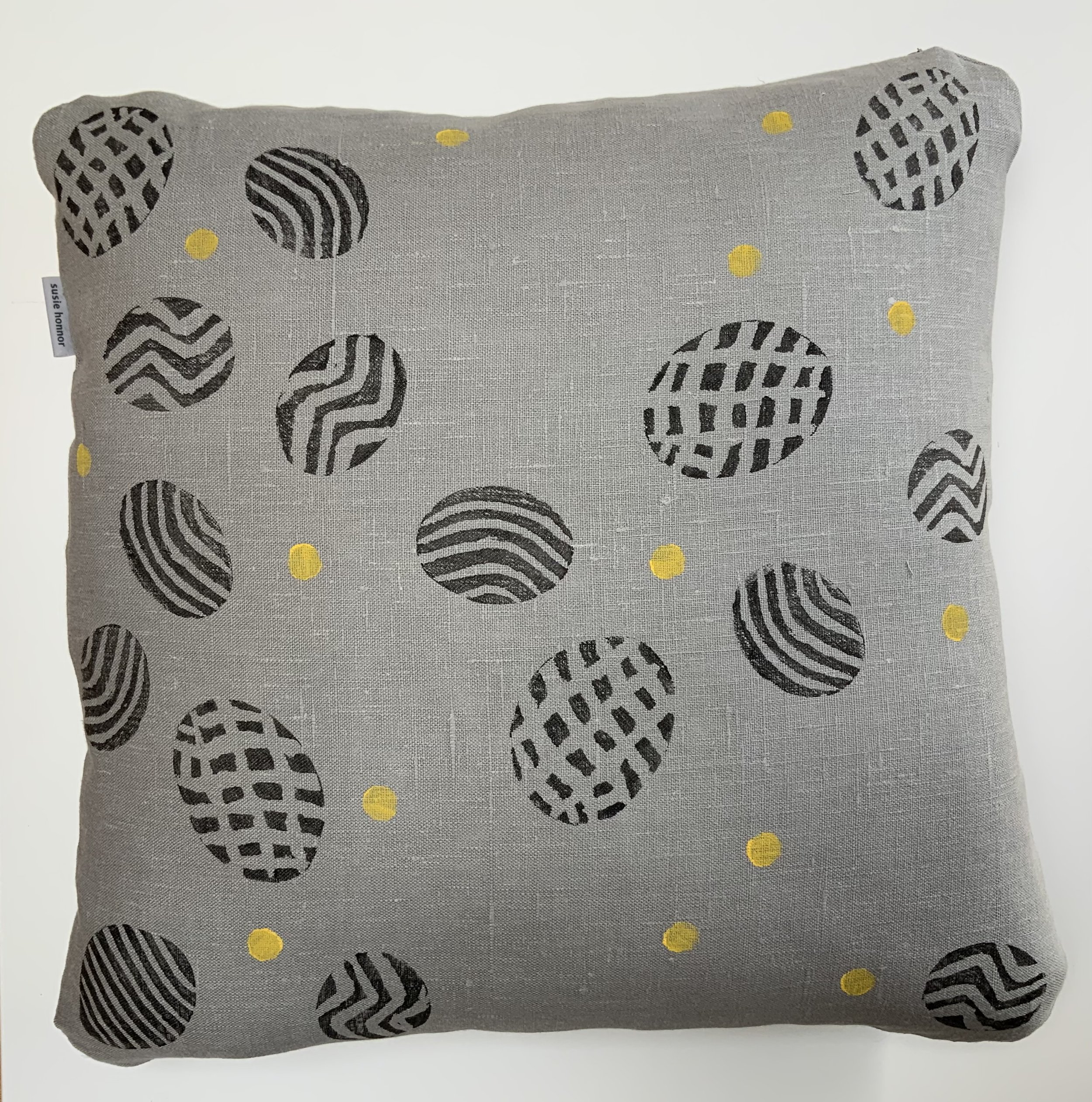Potato print in black patterns with yellow spots on 100%grey linen.