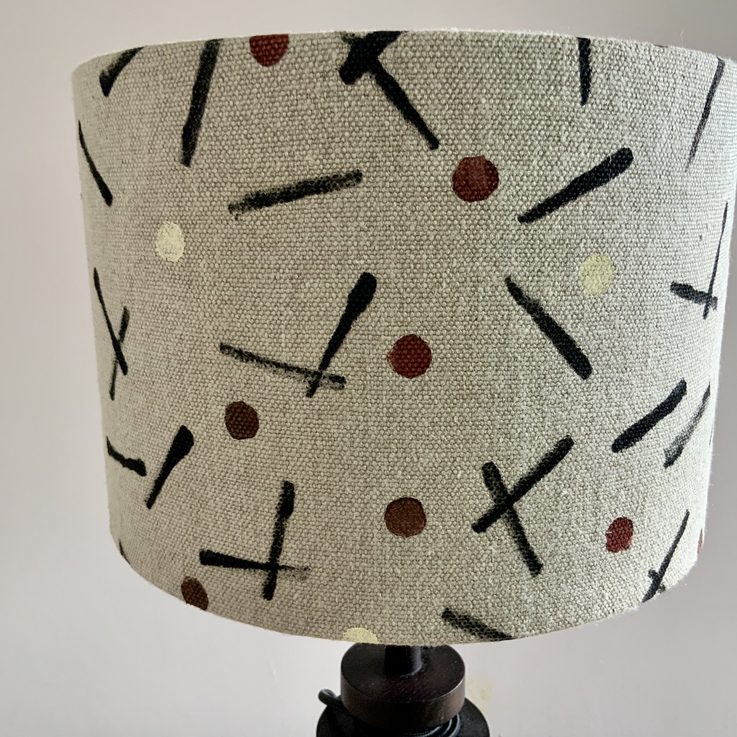 This lampshade has been hand printed in Devon, with potatoes and sustainable fabric inks. 40cm x 21cm.