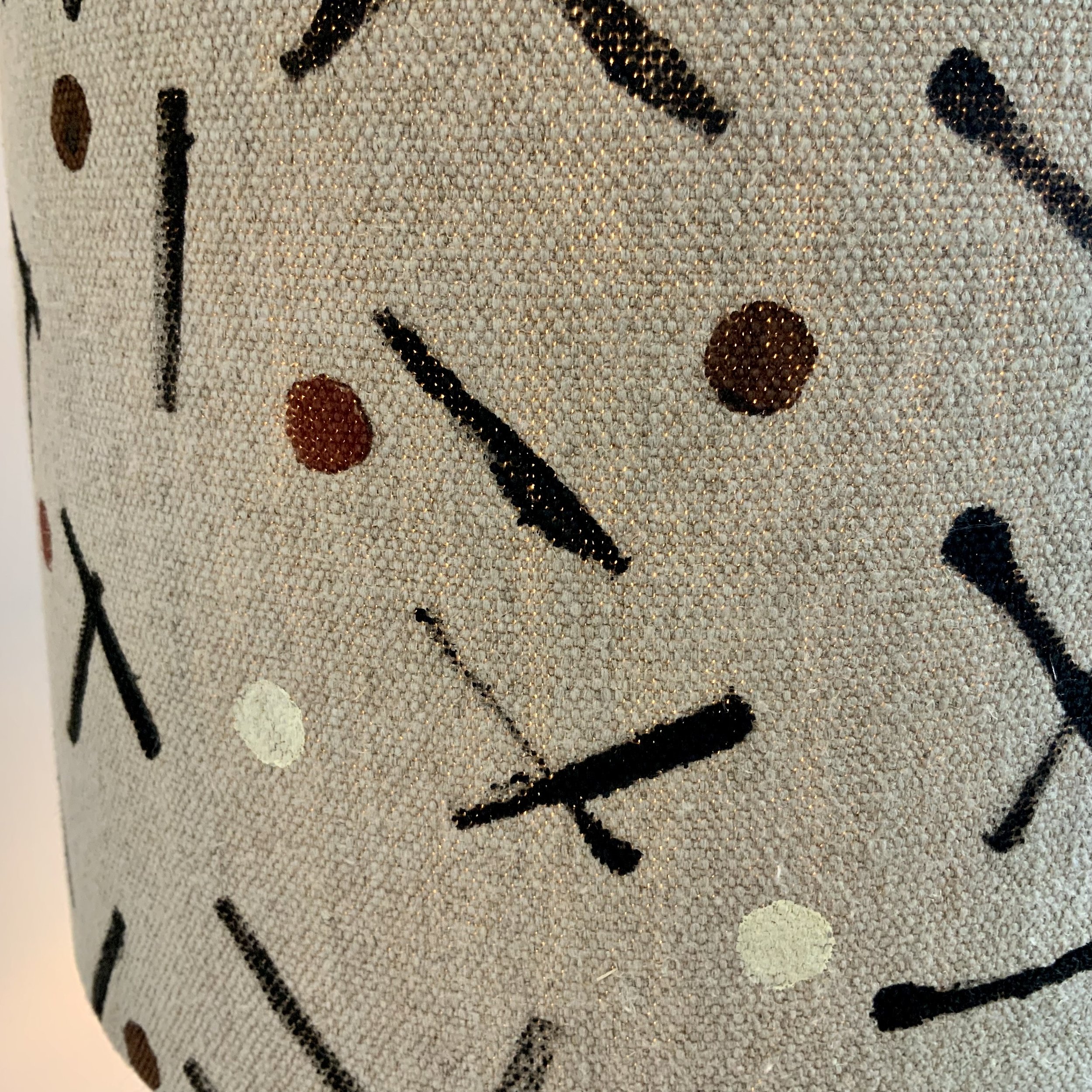 This lampshade has been hand printed in Devon, with potatoes and sustainable fabric inks. 40cm x 21cm.