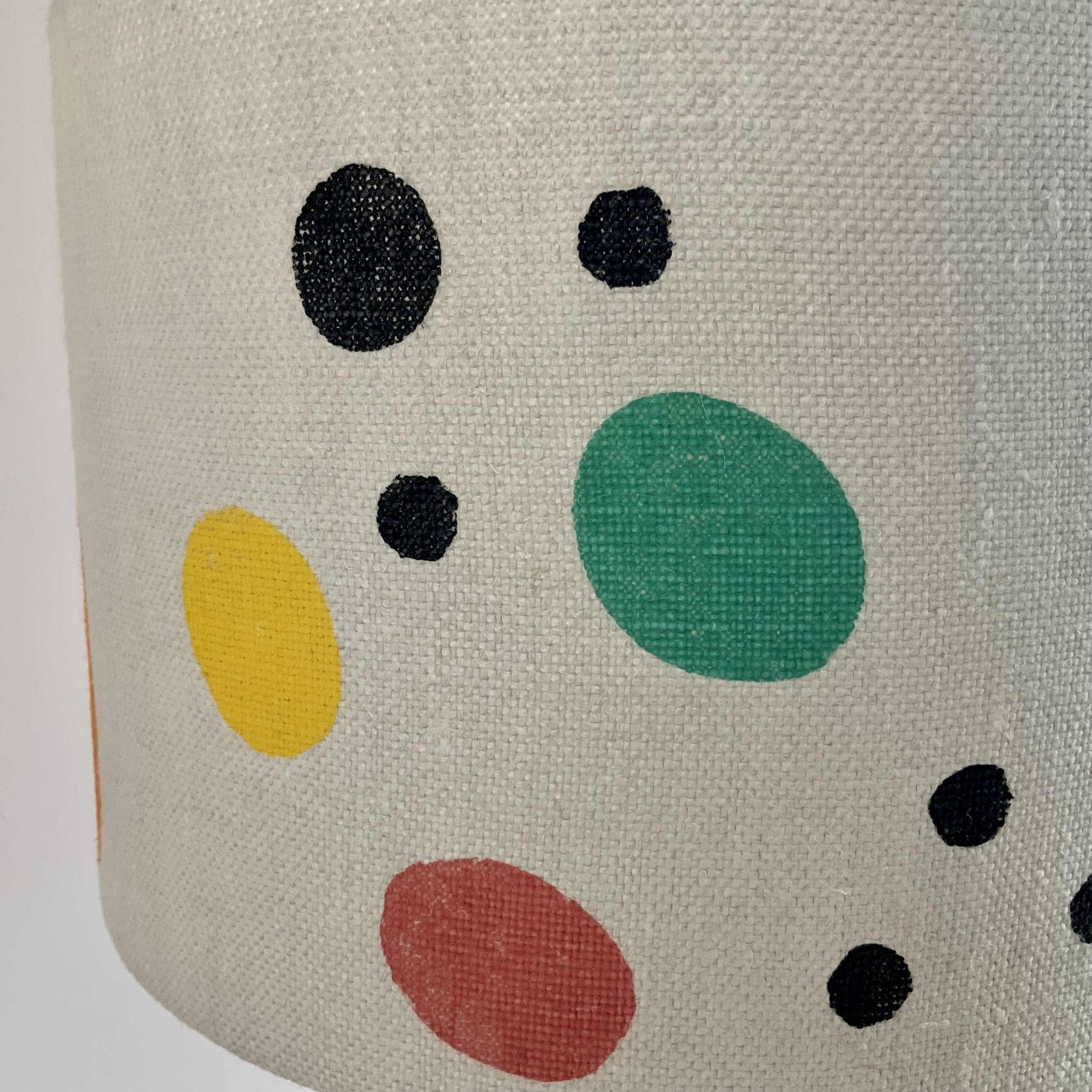 This lampshade has been hand printed in Devon, with potatoes and sustainable fabric inks. 40cm x 21cm.