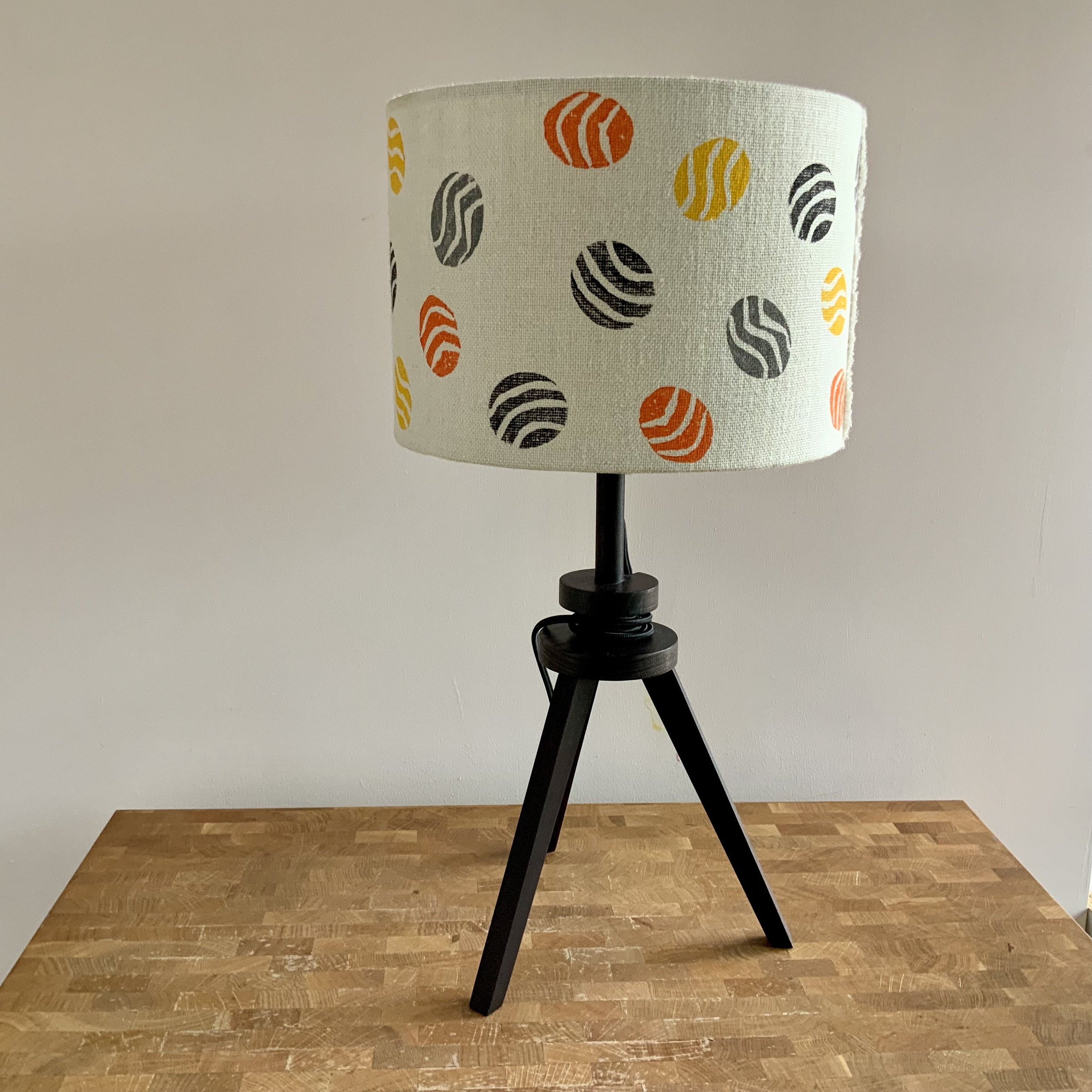 This lampshade has been hand printed in Devon, with potatoes and sustainable fabric inks. 40cm x 21cm.