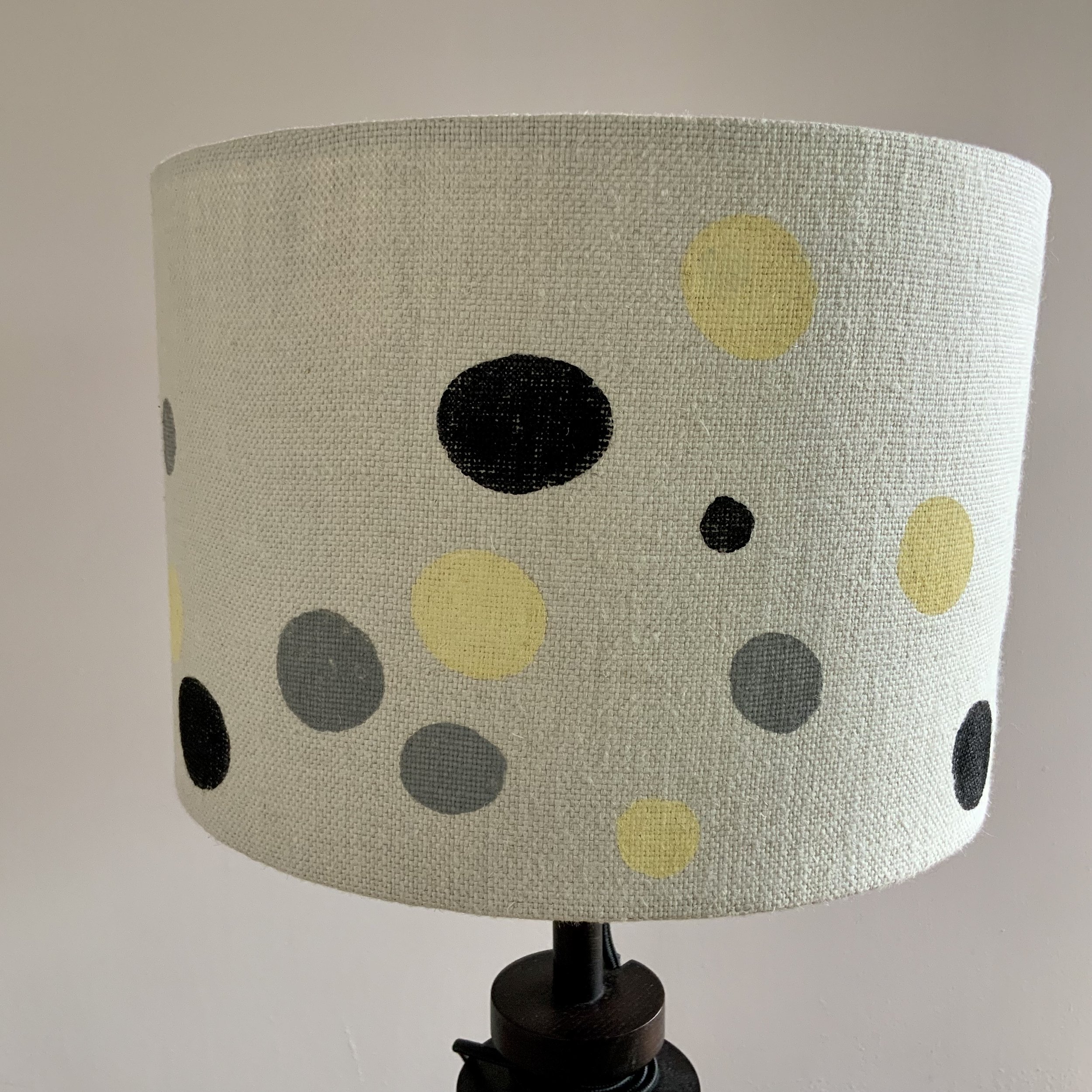 This lampshade has been hand printed in Devon, with potatoes and sustainable fabric inks. 40cm x 21cm.