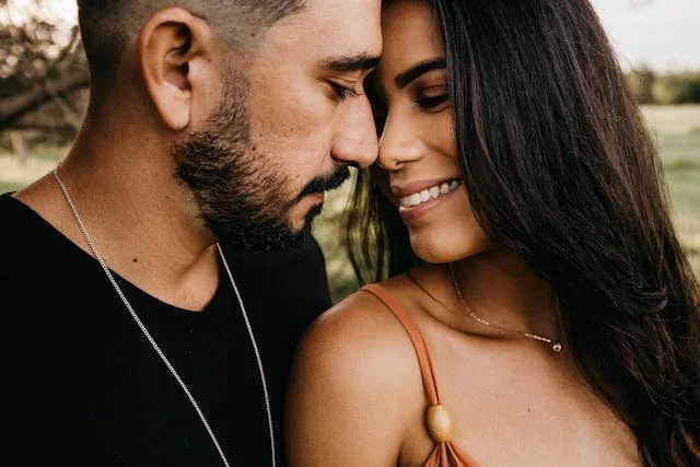 A latino couple hugging
