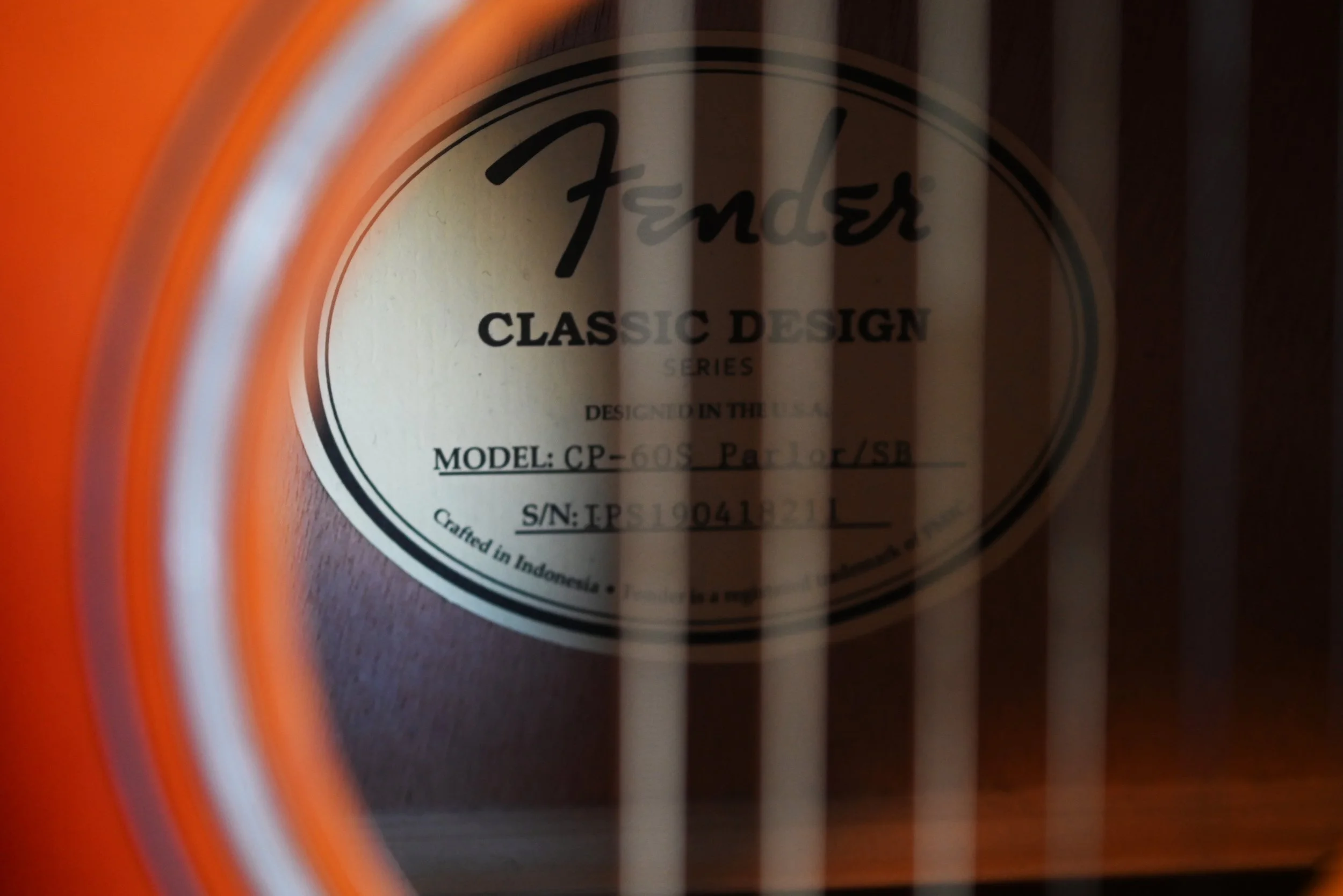 "Fender classic design" is read inside an acoustic guitar in my home on Tuesday, November 8, 2023 in Columbia.
