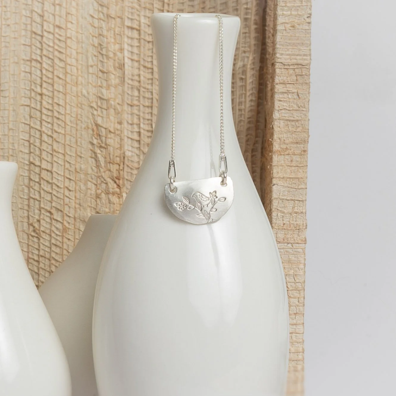 Sterling Silver Stamped Floral Half-Moon Necklace