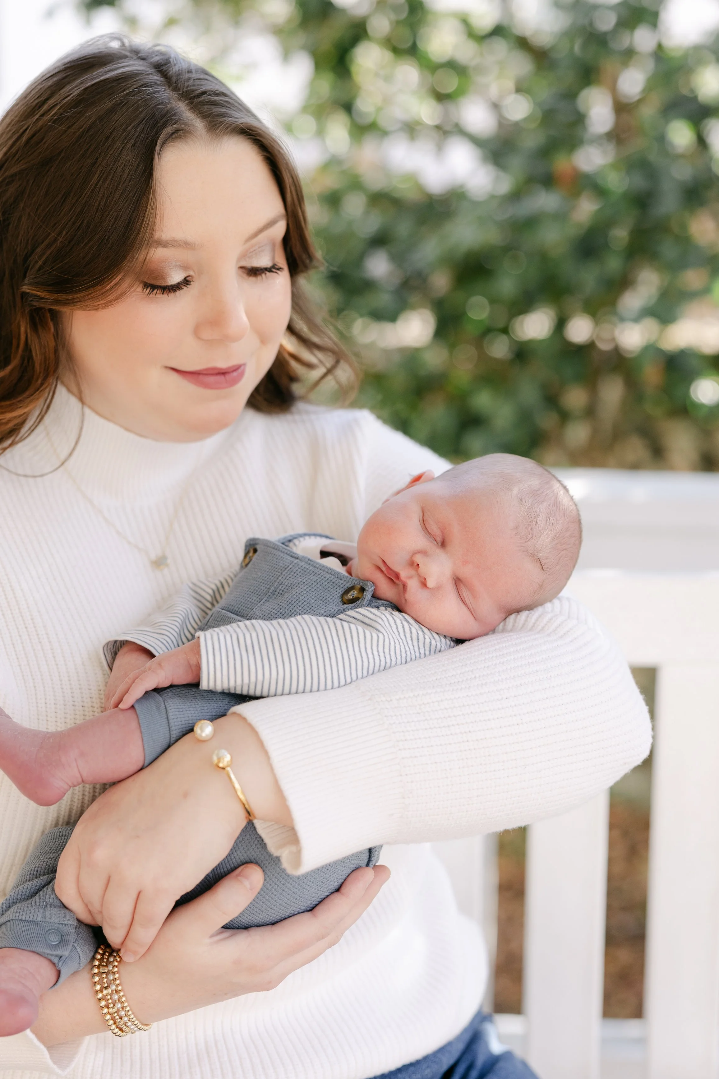 A Baby Steps Student-Mom holding her newborn baby