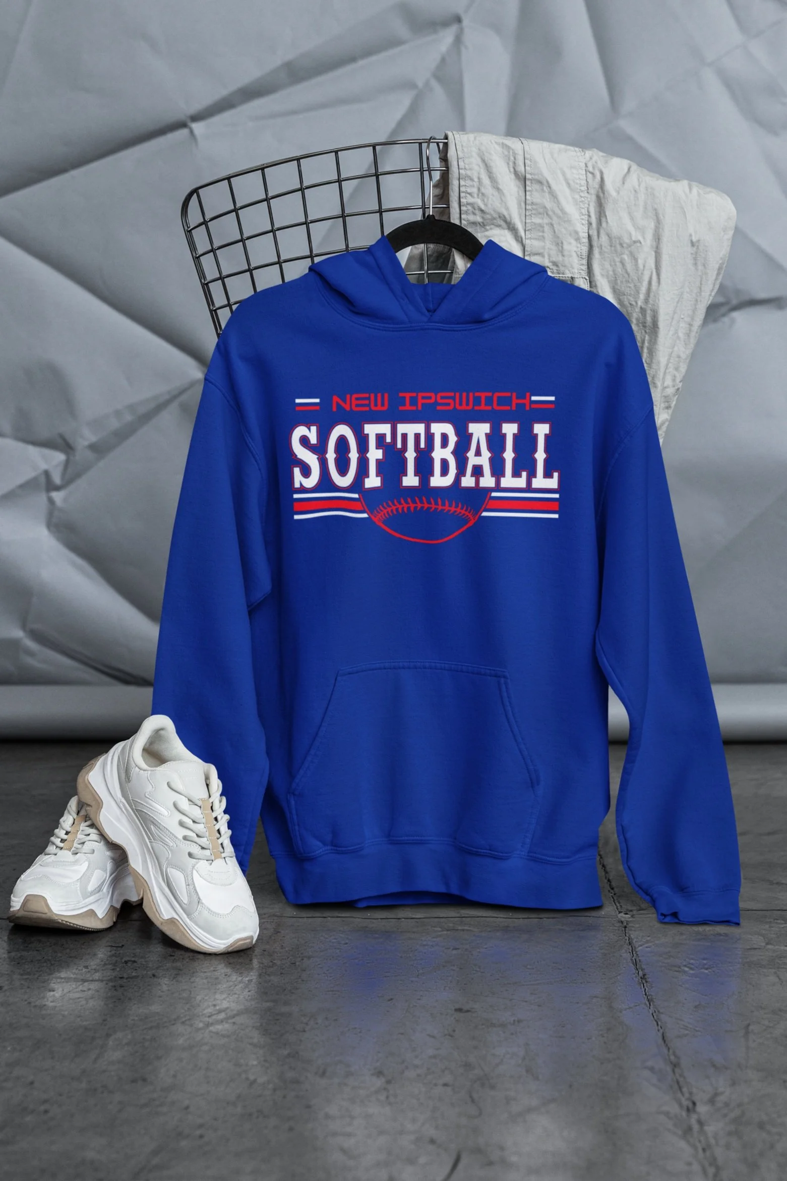 mockup-of-a-gildan-pullover-hoodie-placed-on-a-hanger-with-a-streetwear-outfit-m39762.jpg