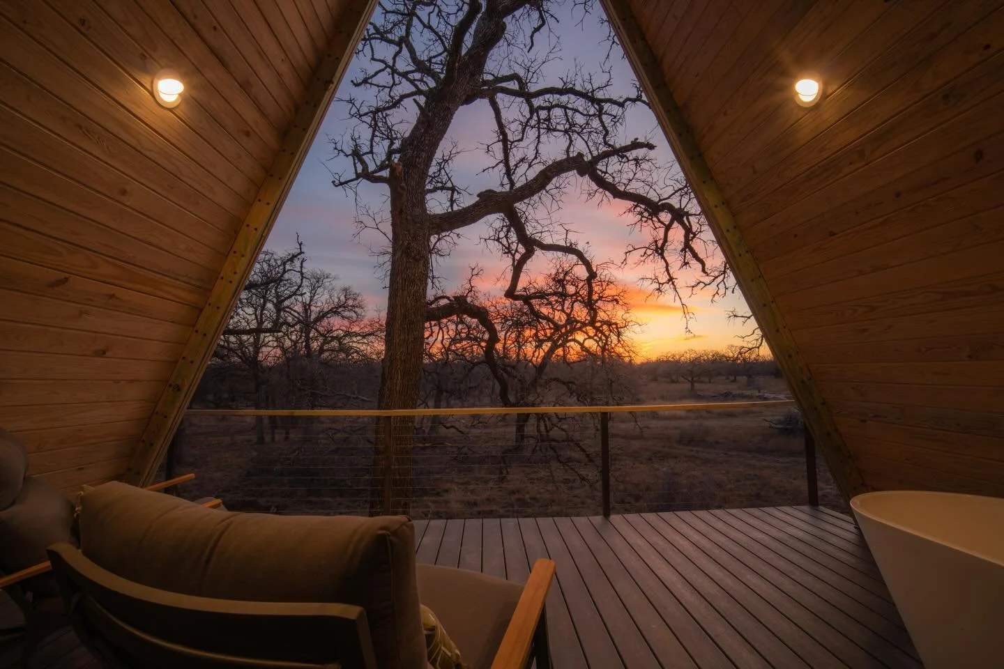 An A-frame at sunset is its own kind of magic &mdash; warm light, big skies, and a place built for slowing down together ✨