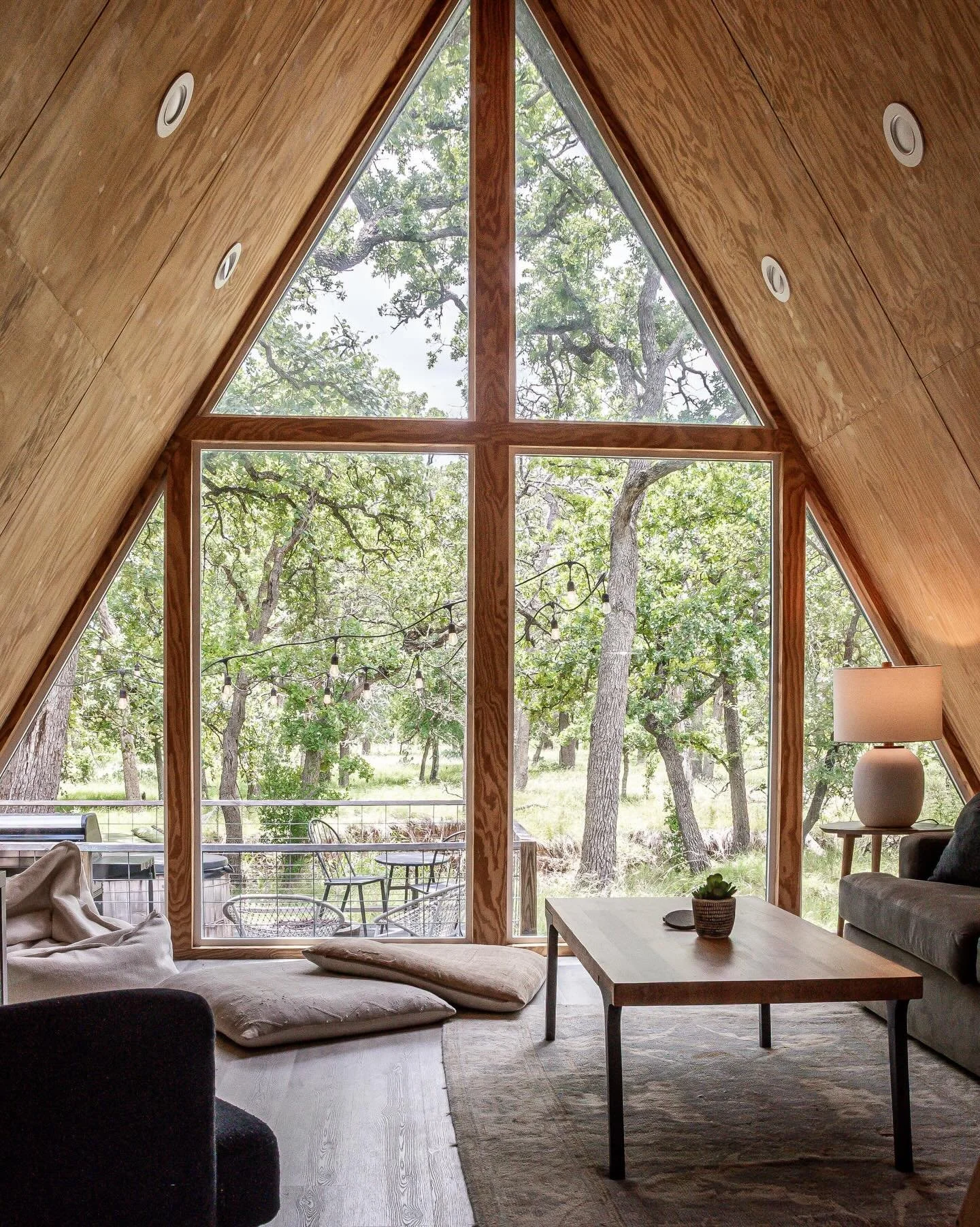 A stay in an A-frame hits different: big windows, crisp air, and the perfect blend of charm and calm.