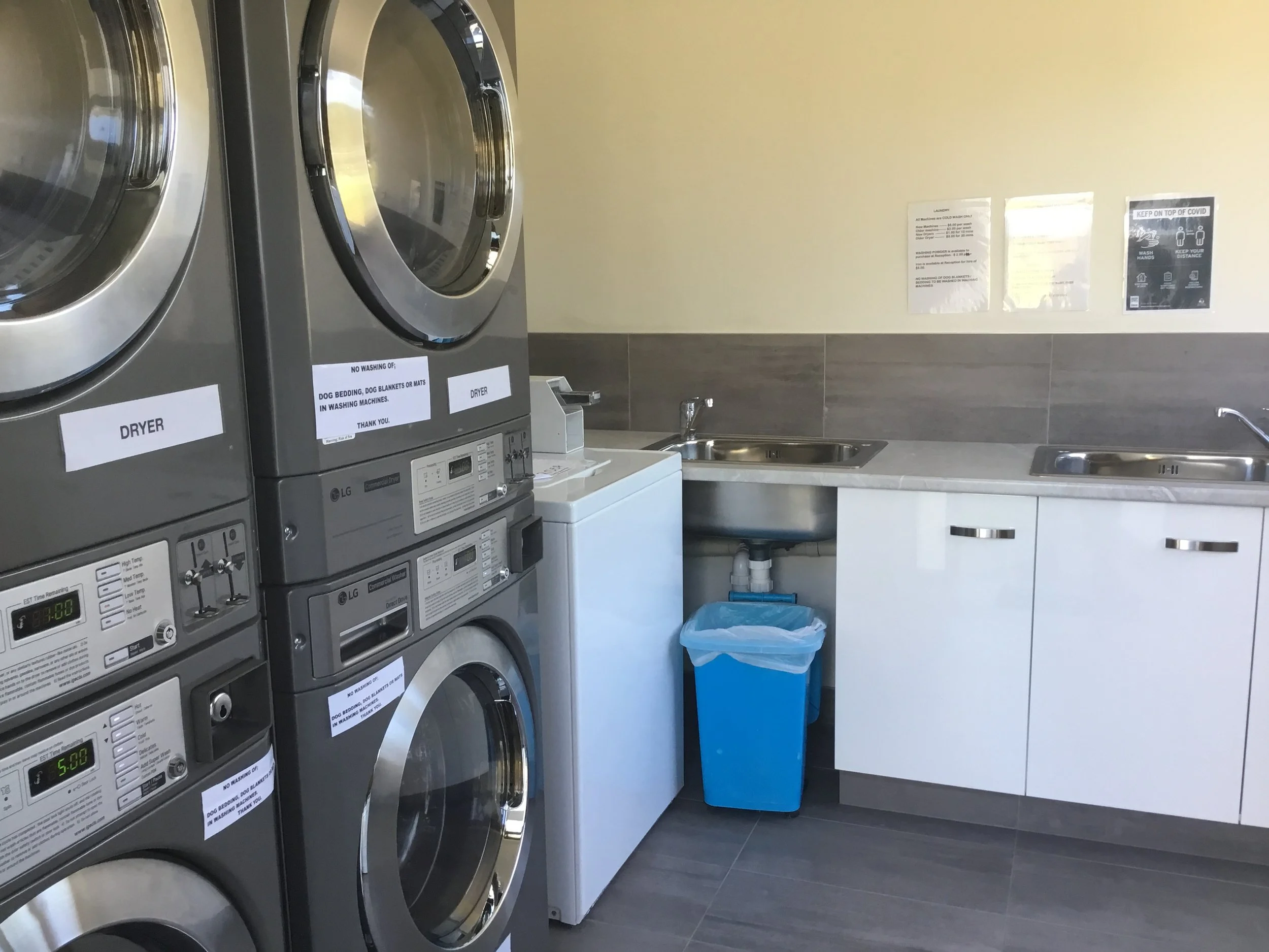 Guest laundry with coin operated washers and dryers