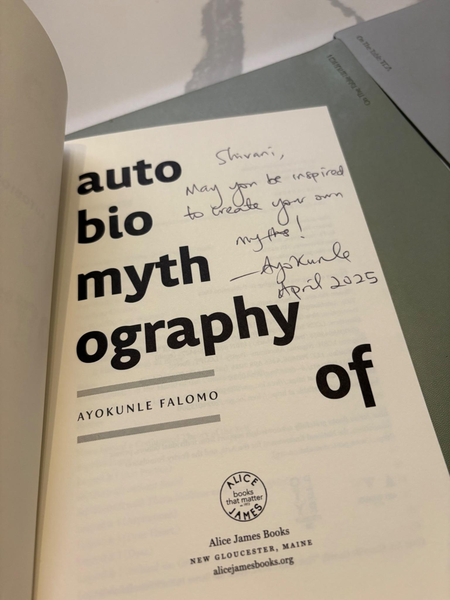 Book page with handwritten inscription by Ayokunle Falomo