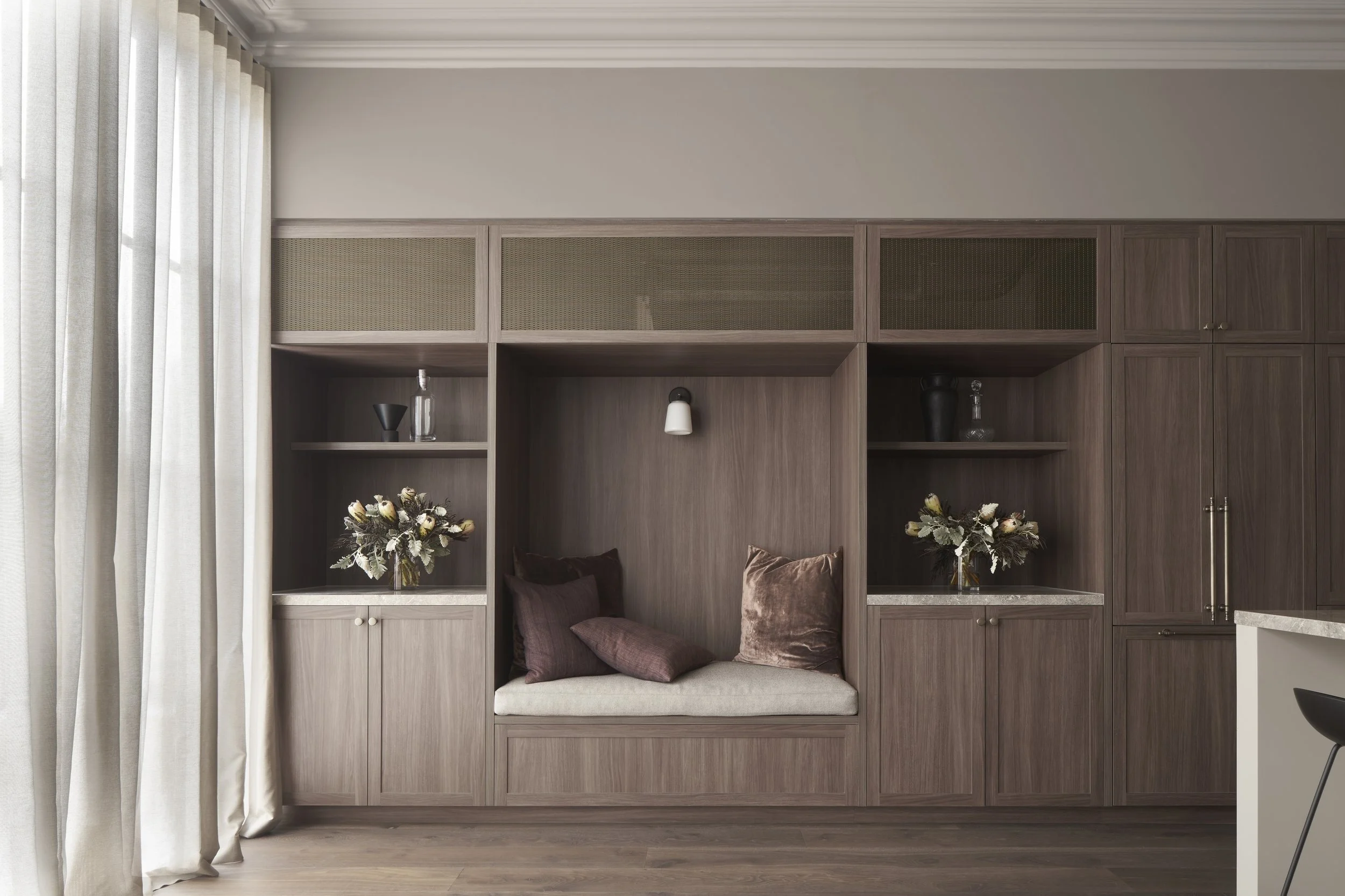 Richmond House timber wall joinery with built-in bench seat and cushions