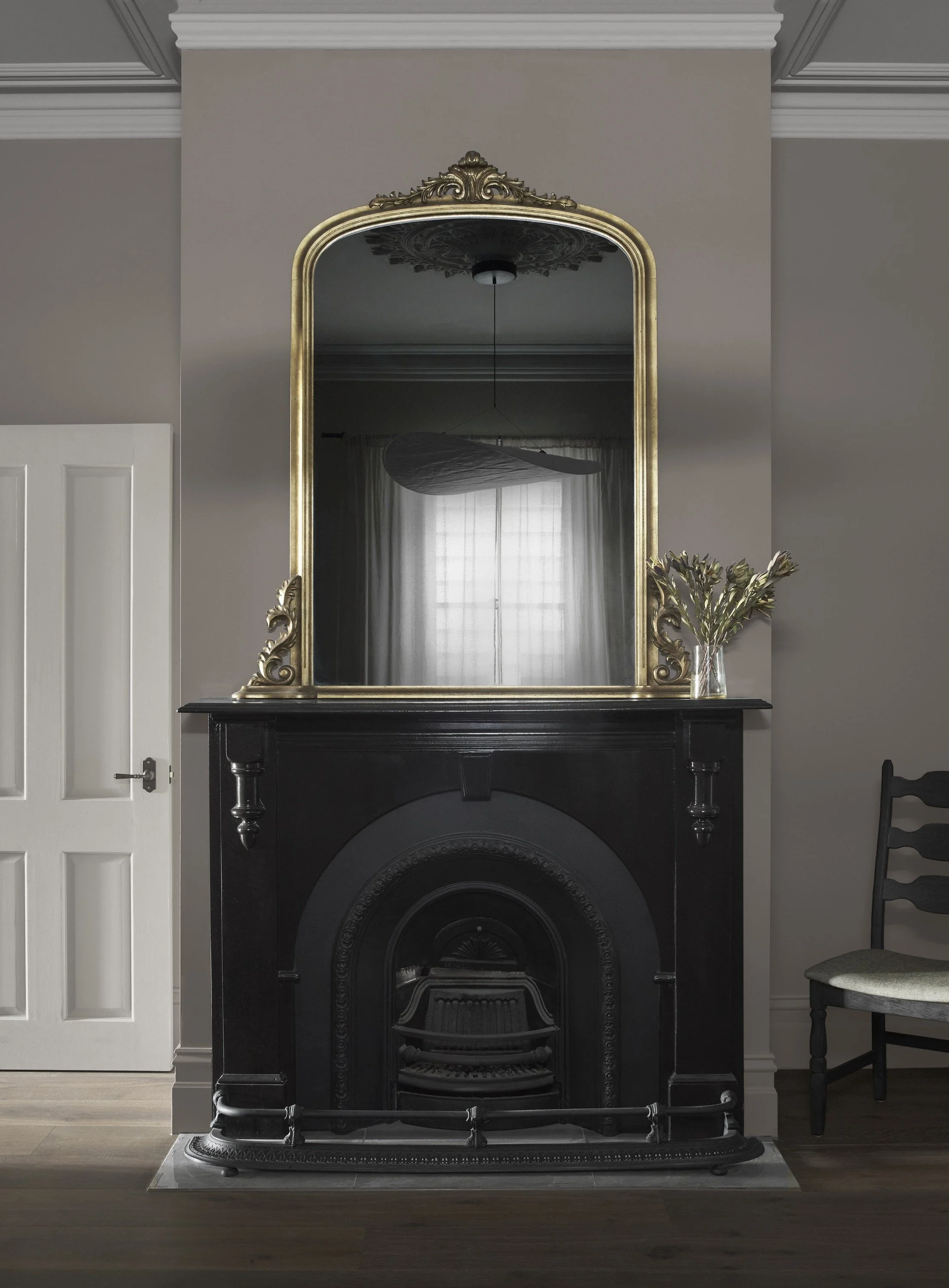 Richmond House black period fireplace with gilt mirror