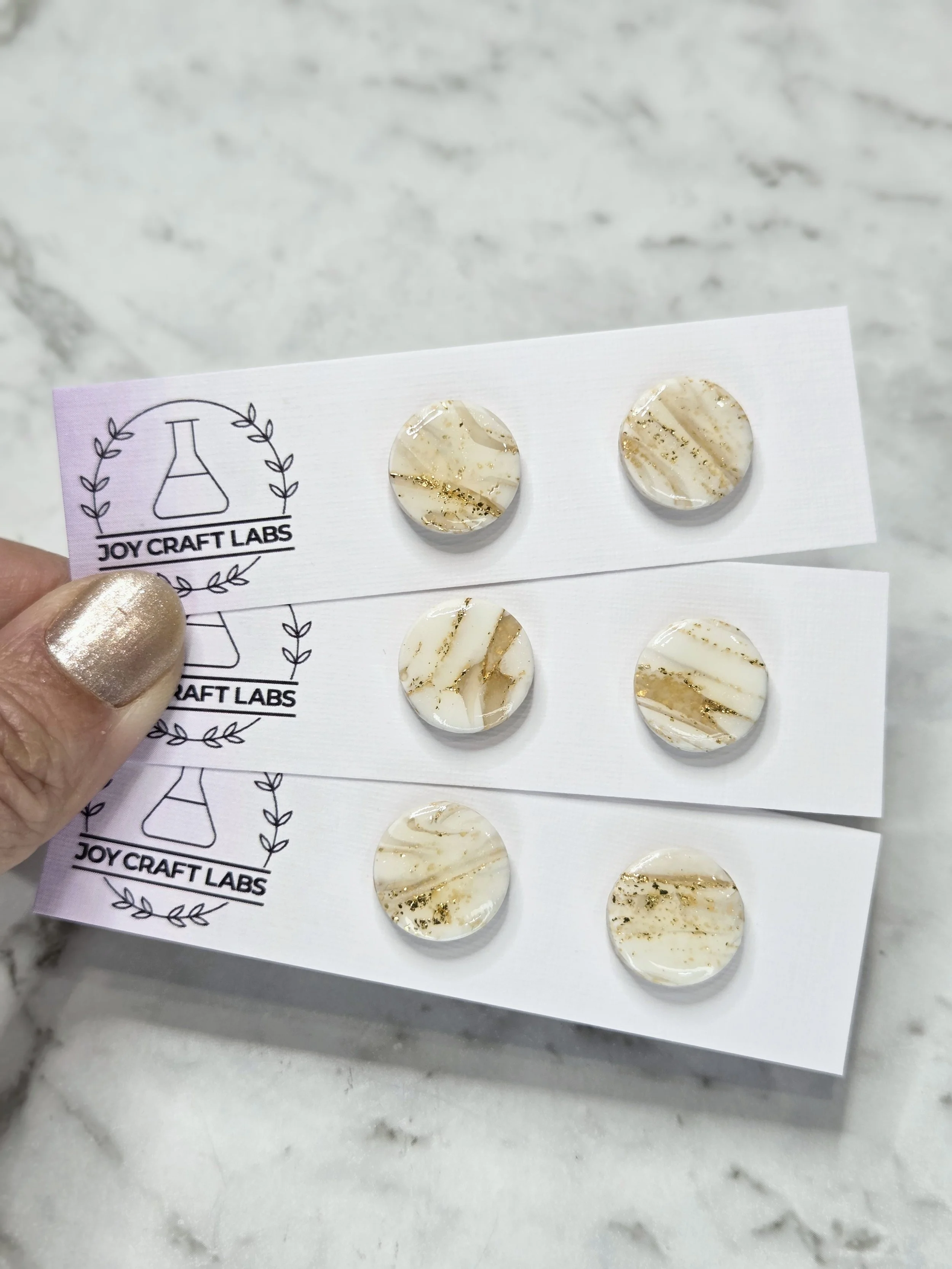 White & Gold faux stone round studs