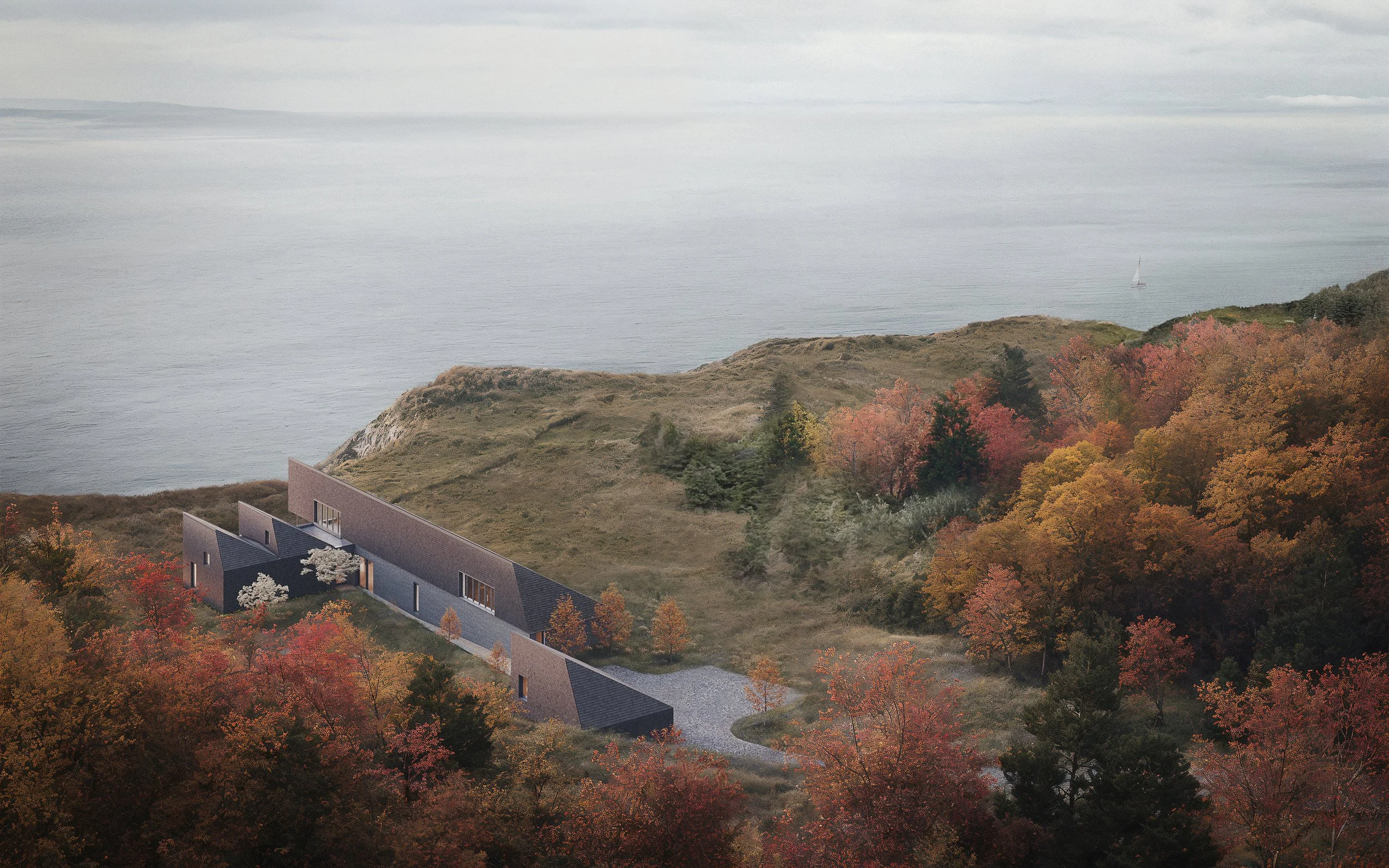 Modern custom home exterior in Cape Breton, Nova Scotia with stone facade and cedar shingled pitched roof