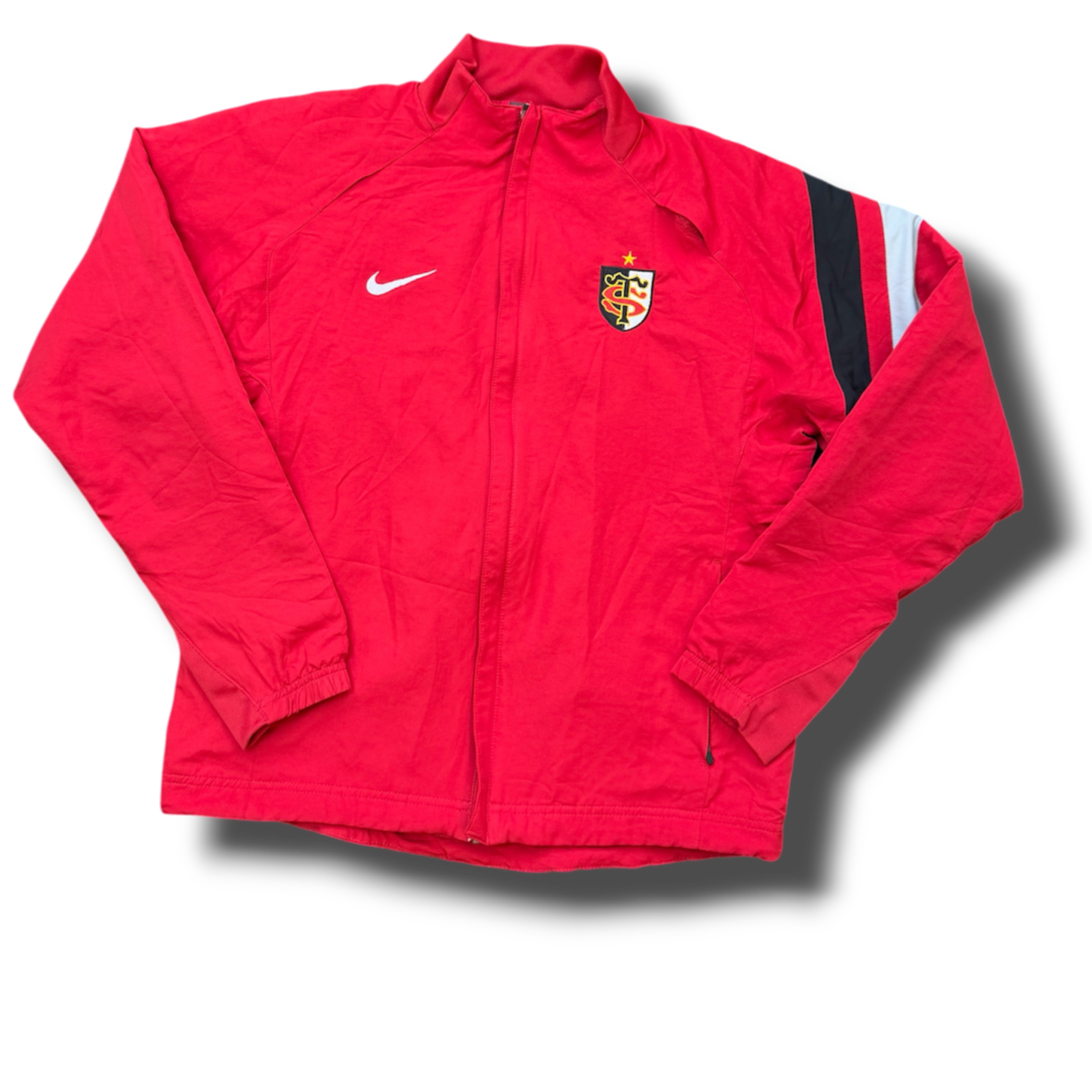 Red Nike sports jacket with the emblem of the German national football team on the chest, a white Nike logo, and a flag strip on the arm.