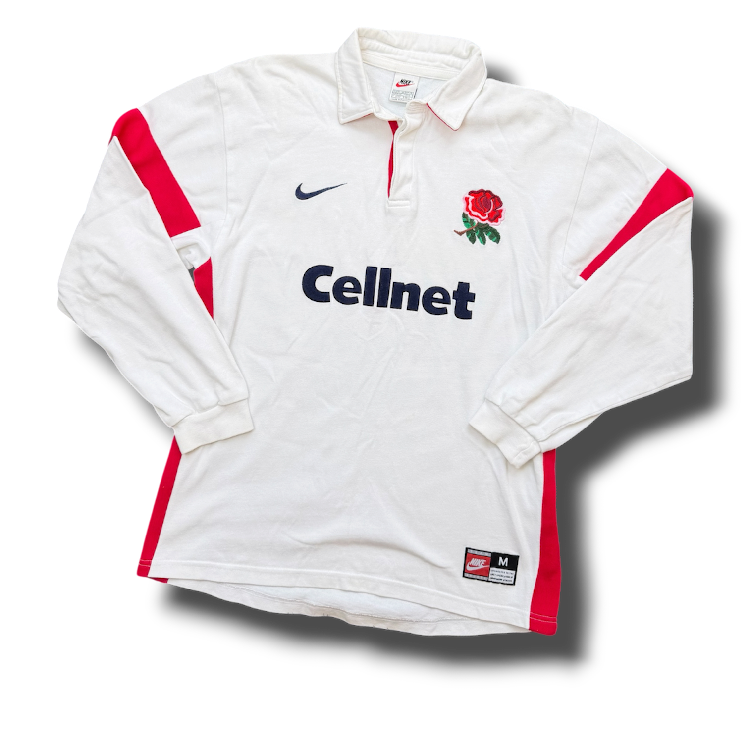 White long-sleeve sports jersey with red accents on the sleeves and sides, Nike logo, Atlanta Olympic logo featuring a red rose, and 'Cellnet' sponsor logo.
