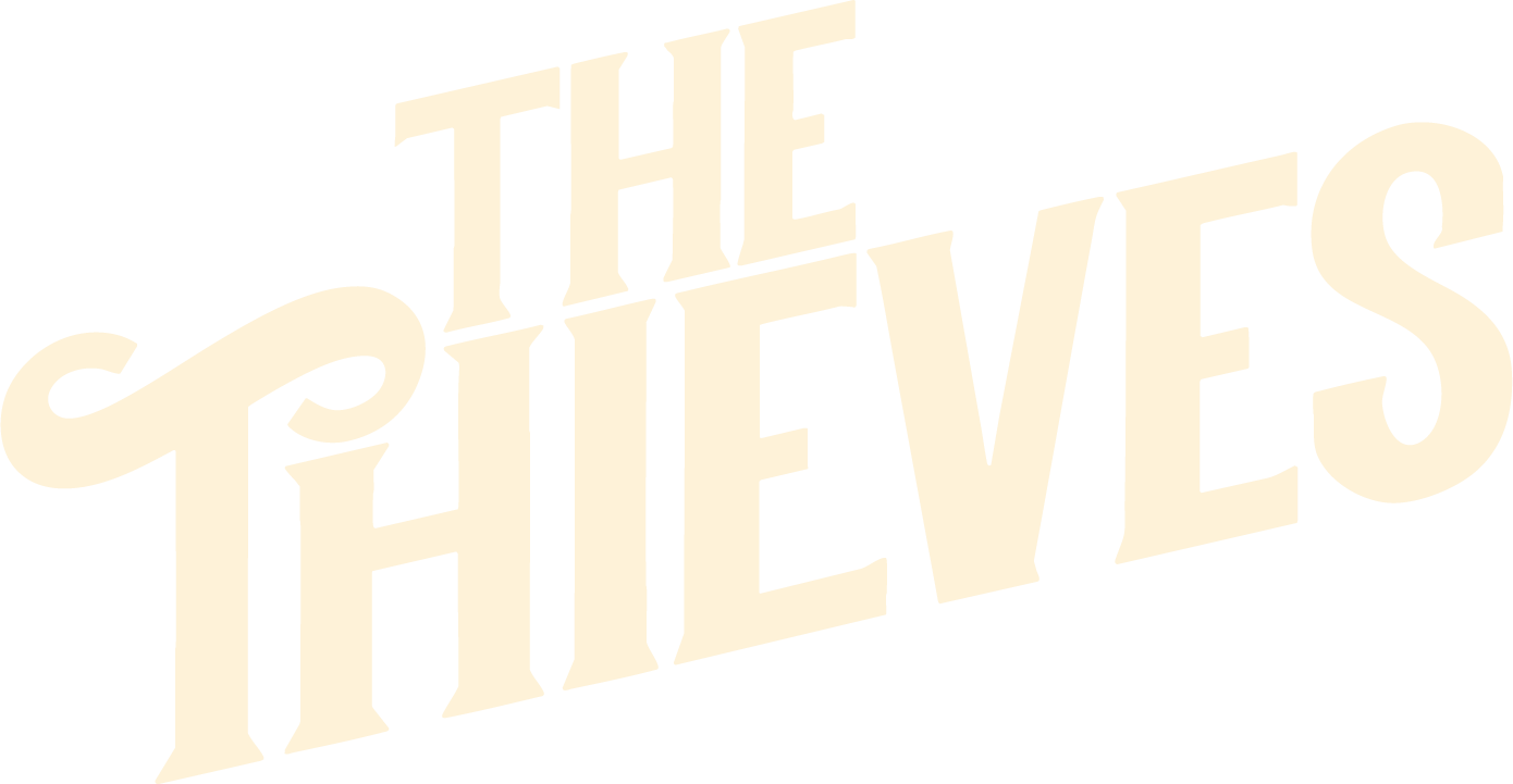 The phrase 'The Thieves' displayed in stylized, cream-colored vintage font on a black background.