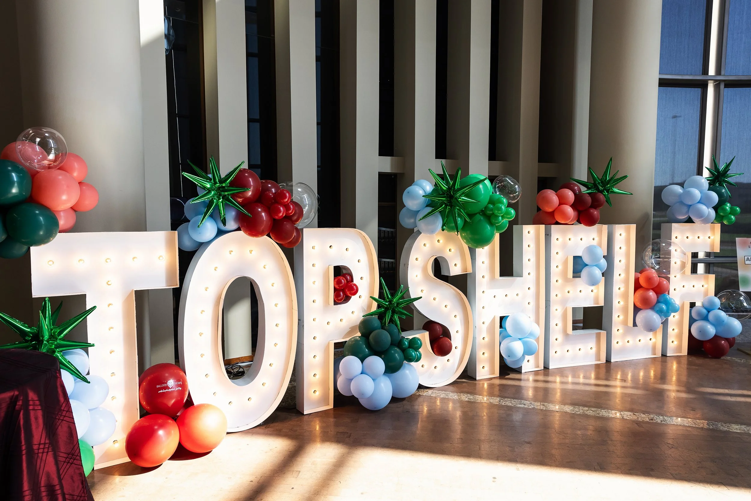 Top Shelf Cuisine &amp; Cocktails Rebranding Event Signage