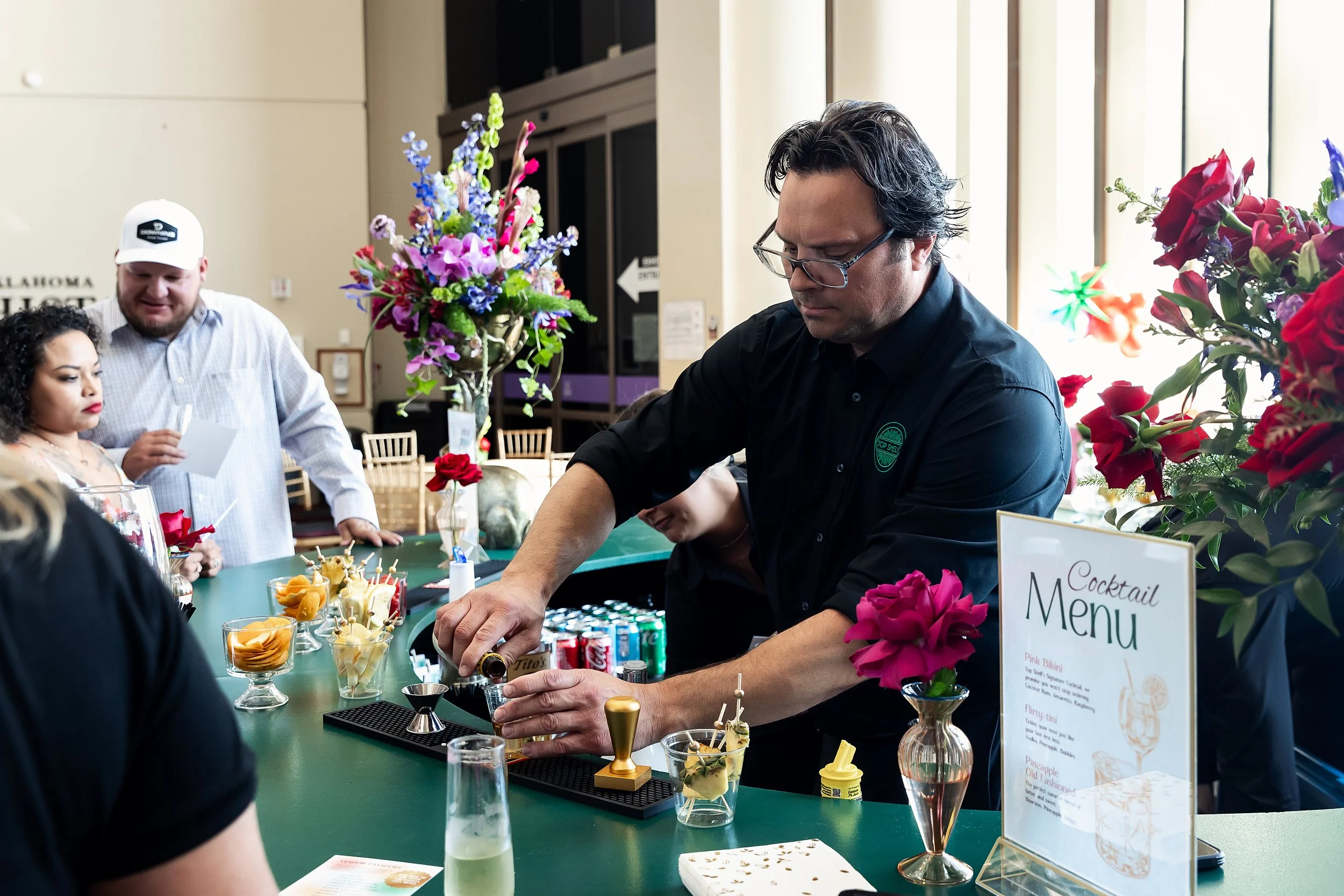 Top Shelf bartender serving guests at a private event in Oklahoma City
