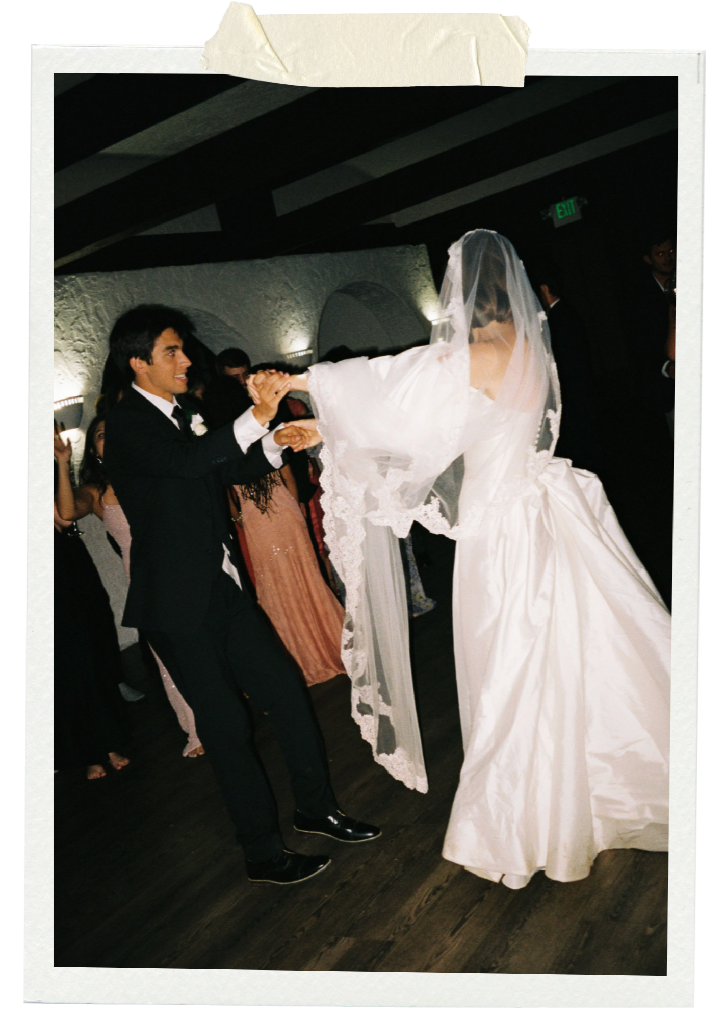 The bride and groom's first dance at Villa Parker in Parker, Colorado. It is a flash photo taken on 35mm film.