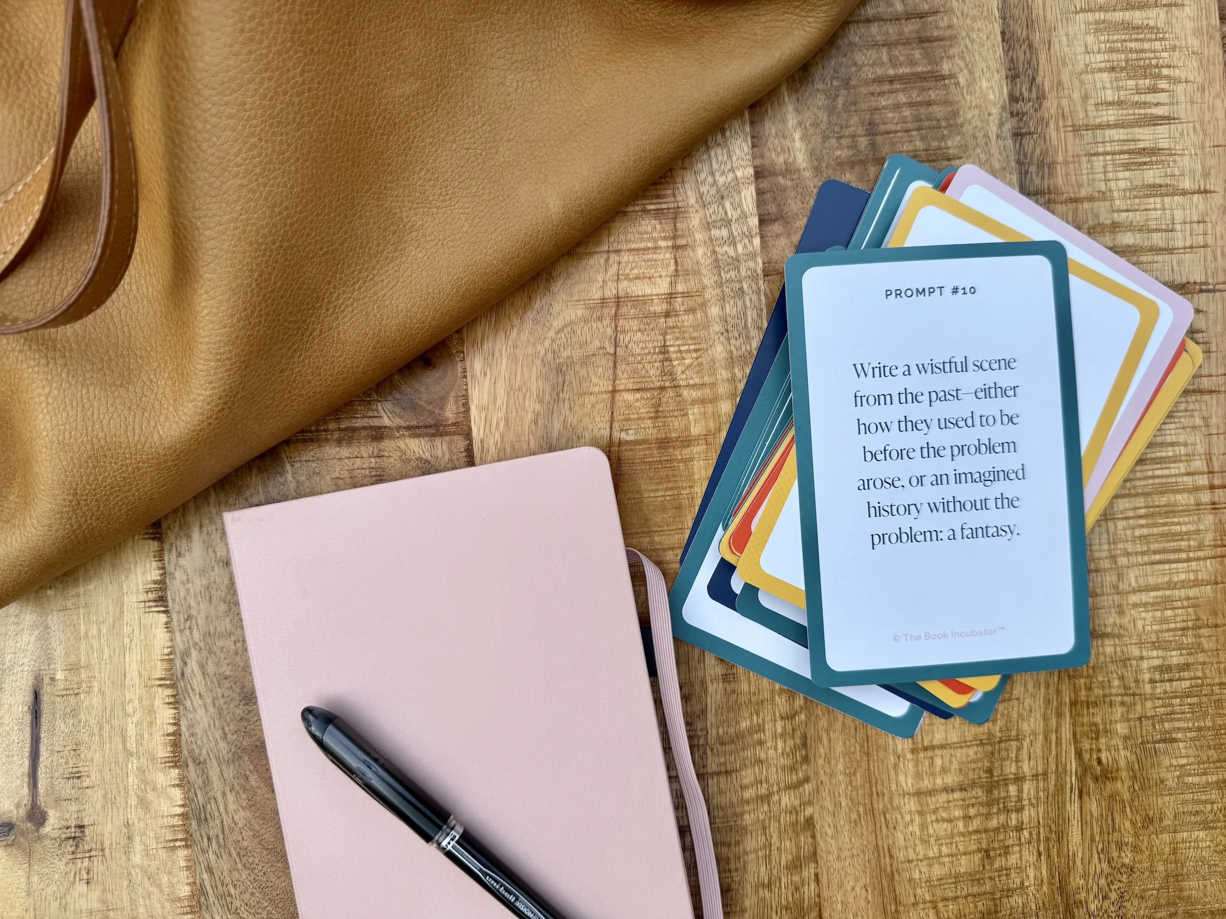 Cards on table with pen.jpg