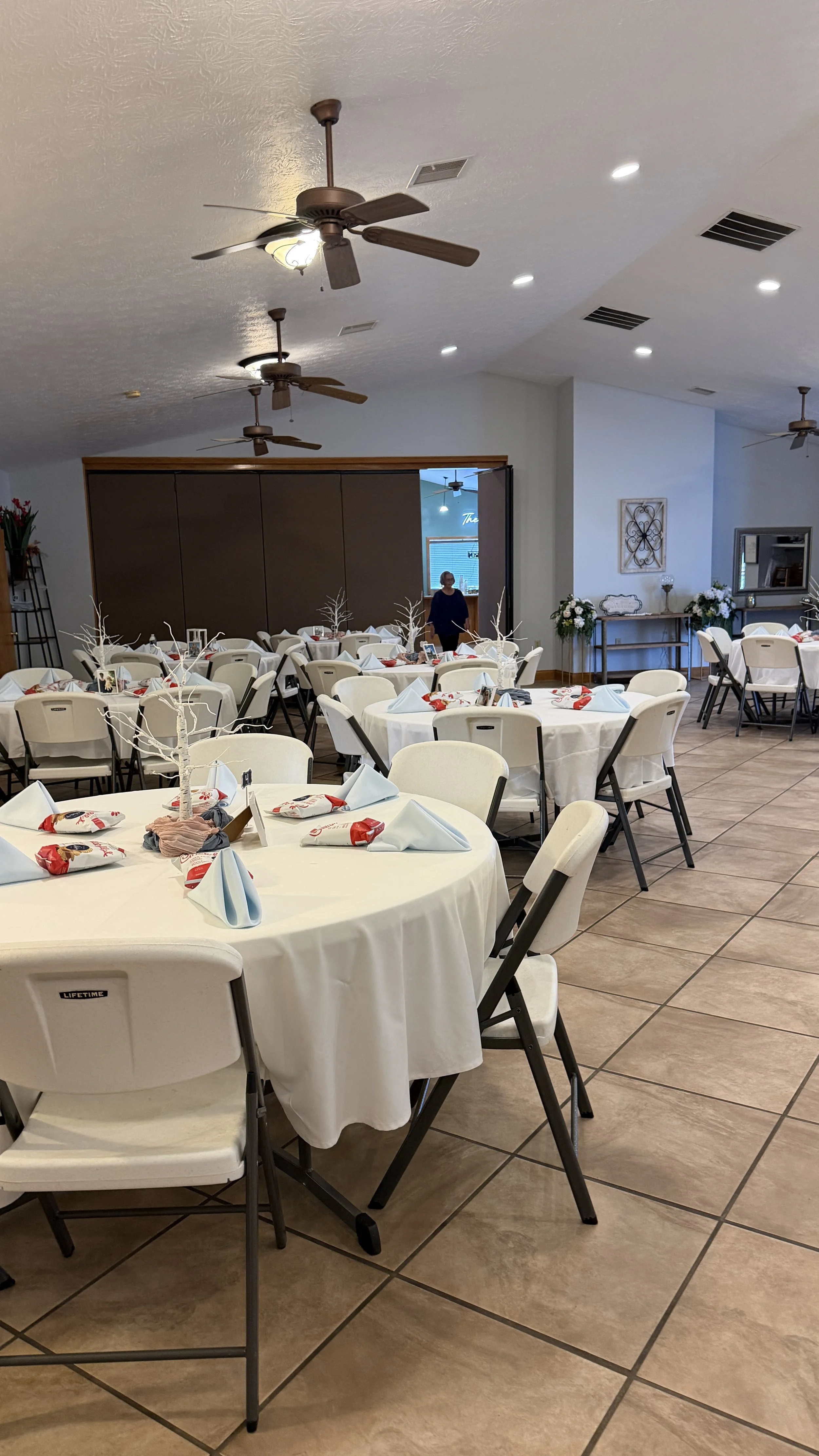 The Main Room at The GEM by Christopher’s in Dayton, Ohio, arranged with round tables and seating for a larger private event and weddings