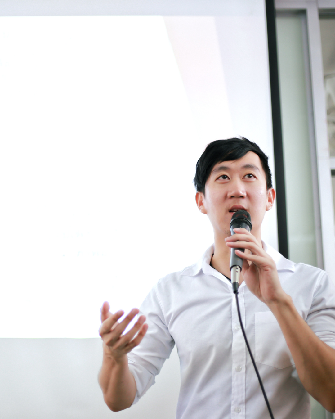 Seed stage founder delivering investor pitch presentation to raise capital