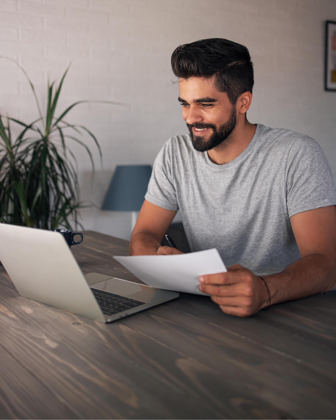 Tech founder reviewing investor pitch deck at desk