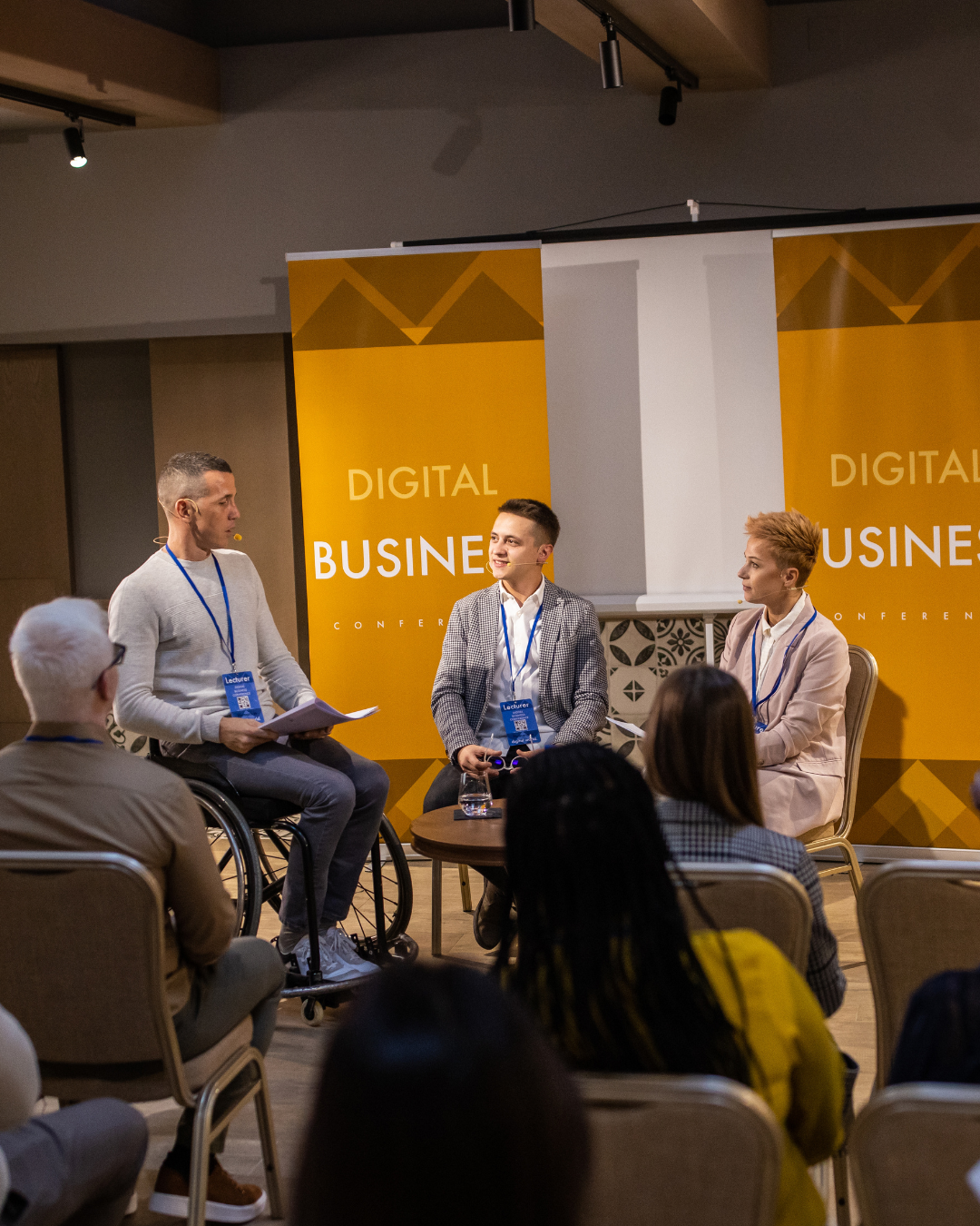 3 startup founders talking about tech product on a panel