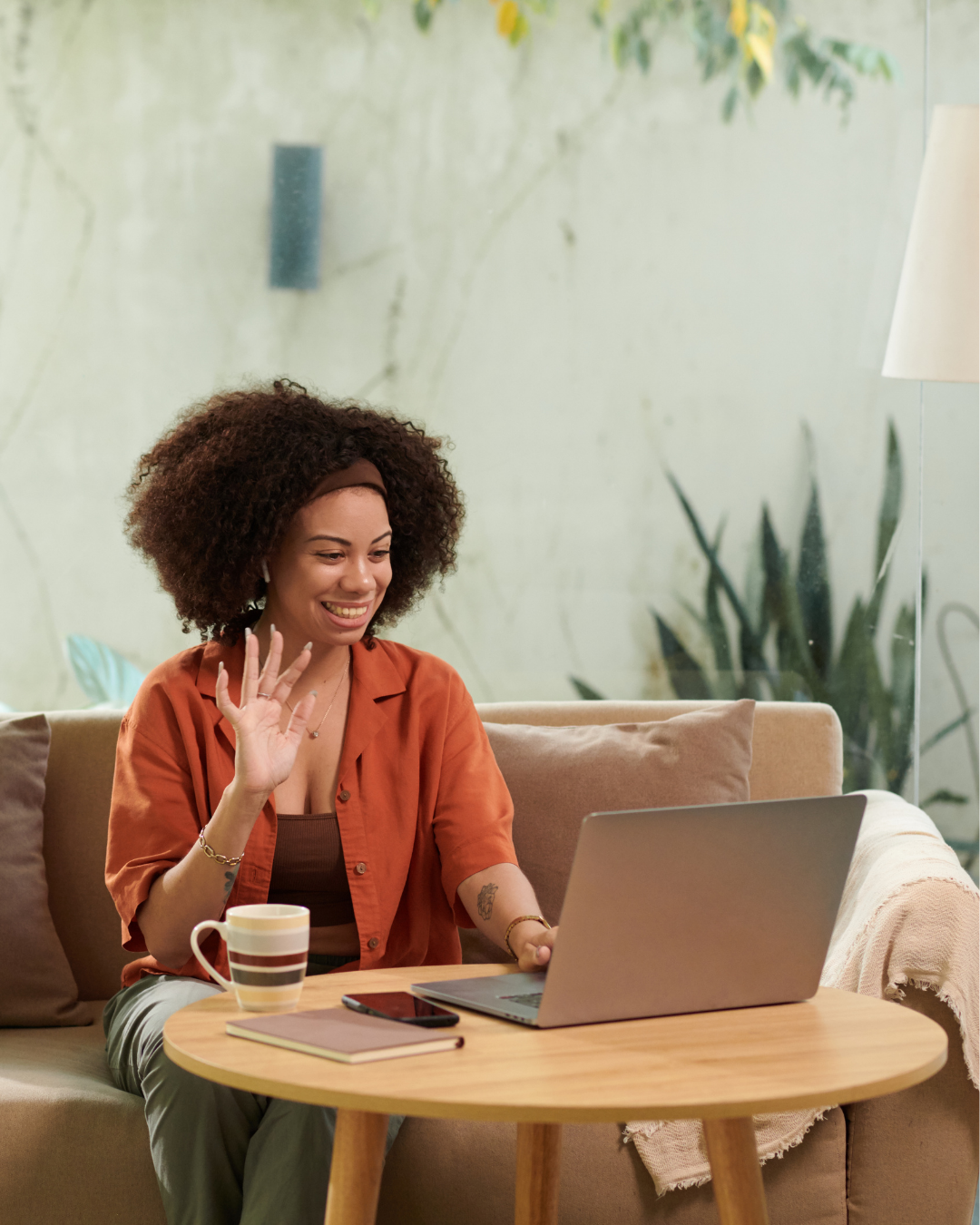 Female tech founder practicing investor pitch on video call