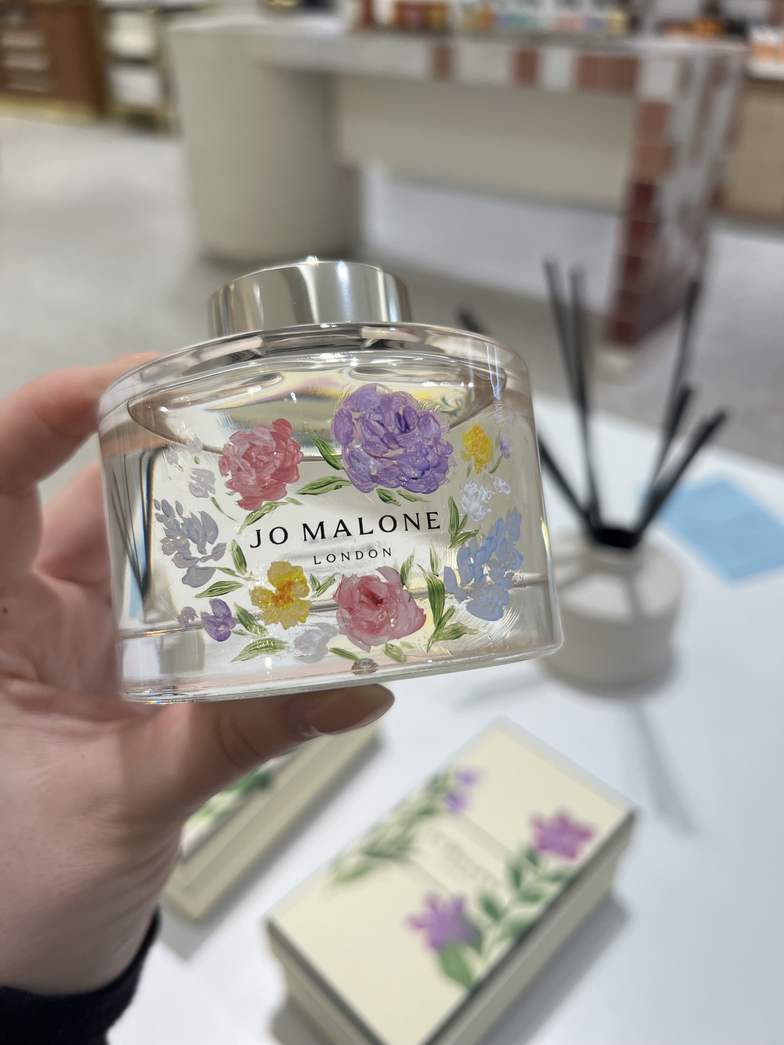 spring-flowers-hand-painting-on-jo-malone-bottle-during-brand-activation.jpeg