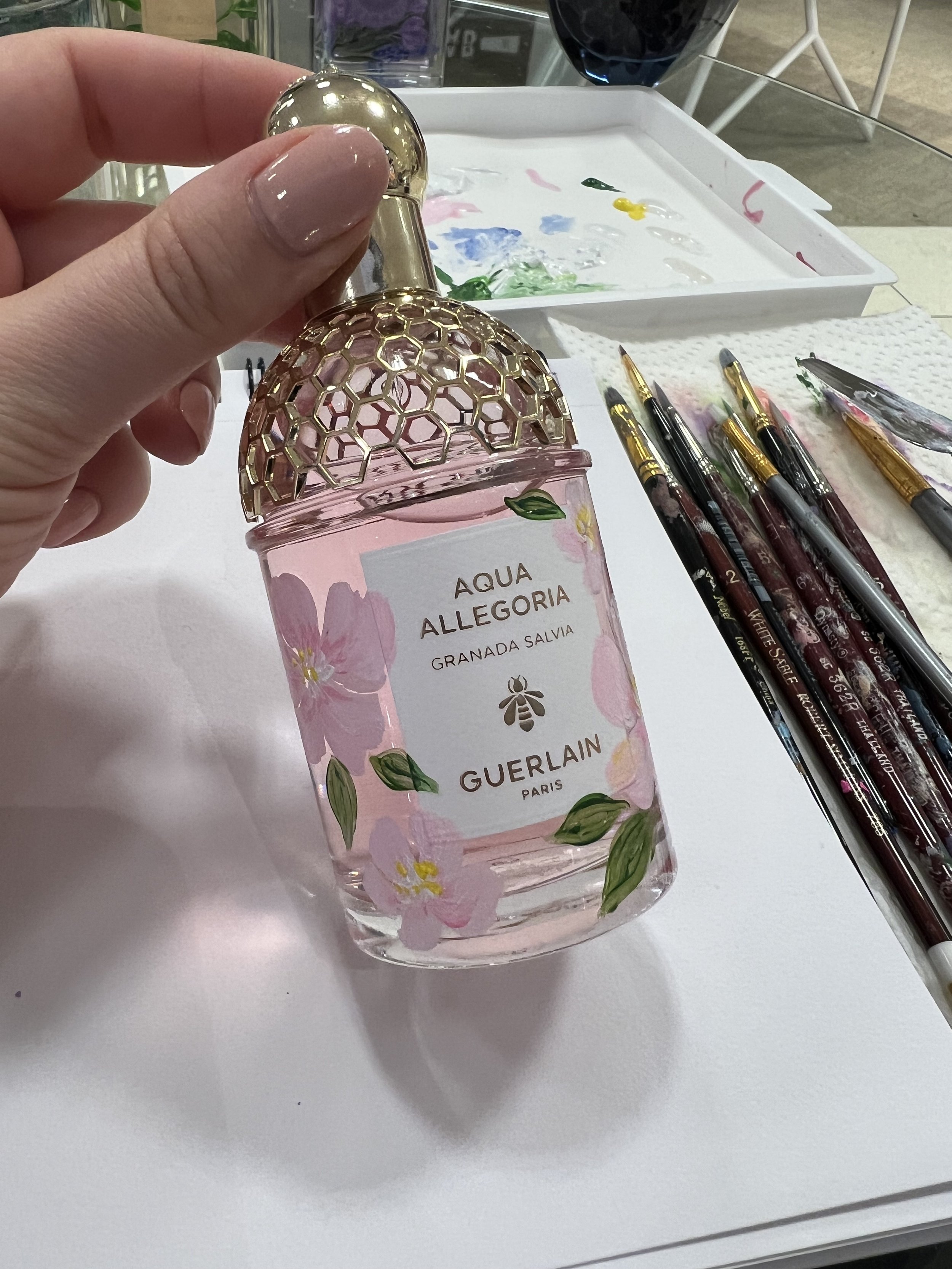 pretty-flowers-painted-on-luxury-fragrance-bottle-for-mothers-day-retail-event-montreal.jpeg