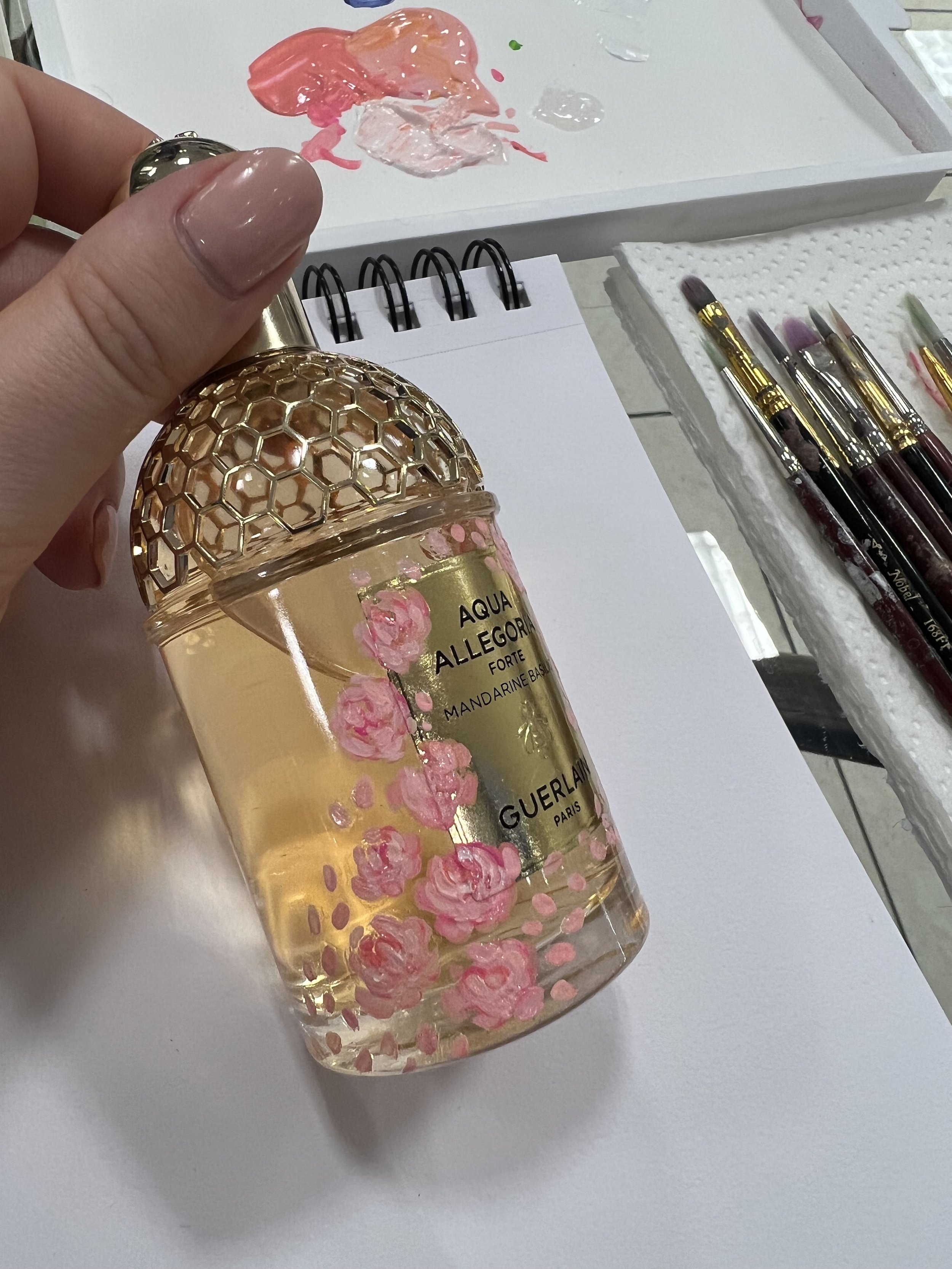 roses-painted-on-guerlain-bottle-at-the-bay-laval.jpeg