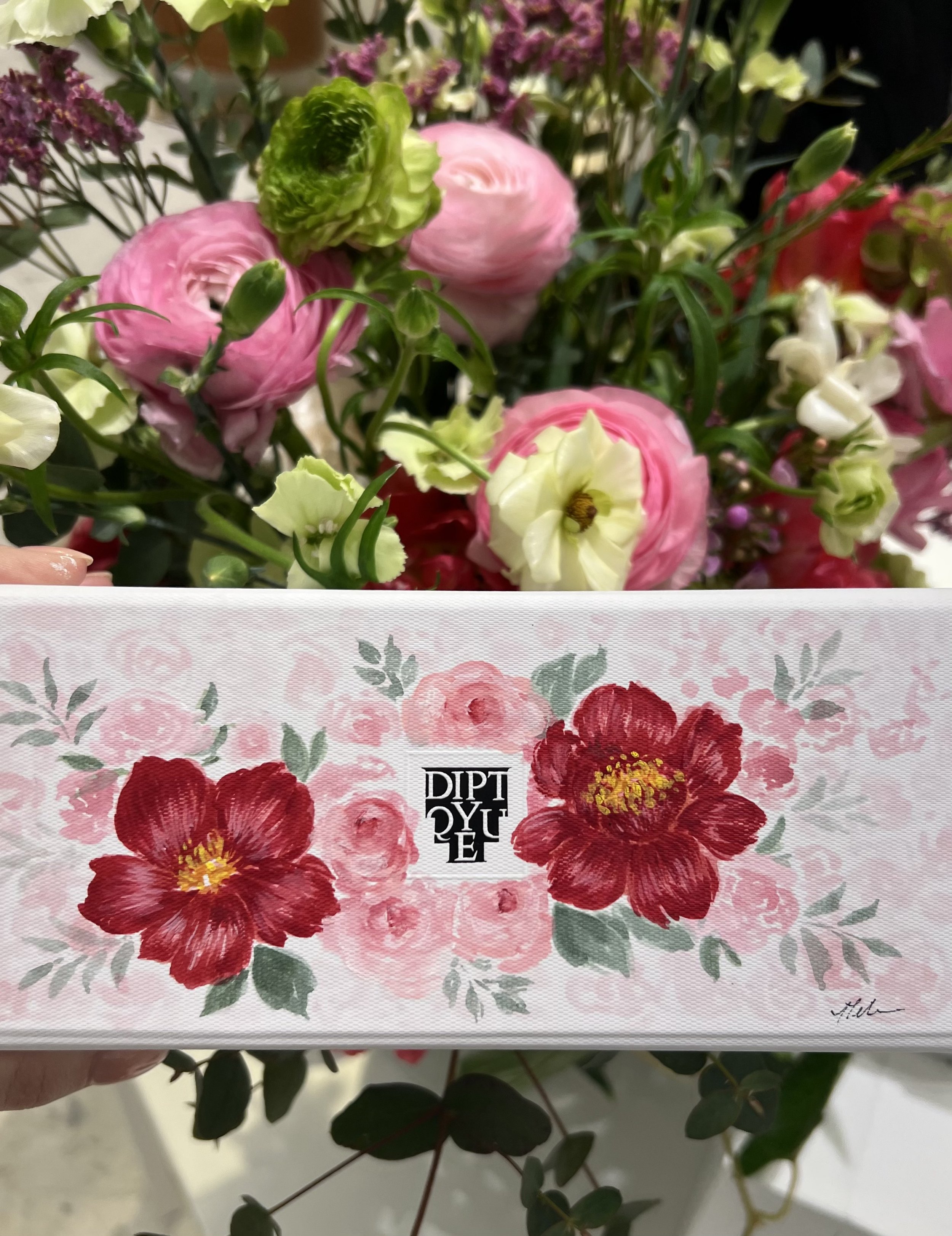 peony-and-rose-painting-on-diptyque-boxes-for-montreal-shopping-event.jpeg
