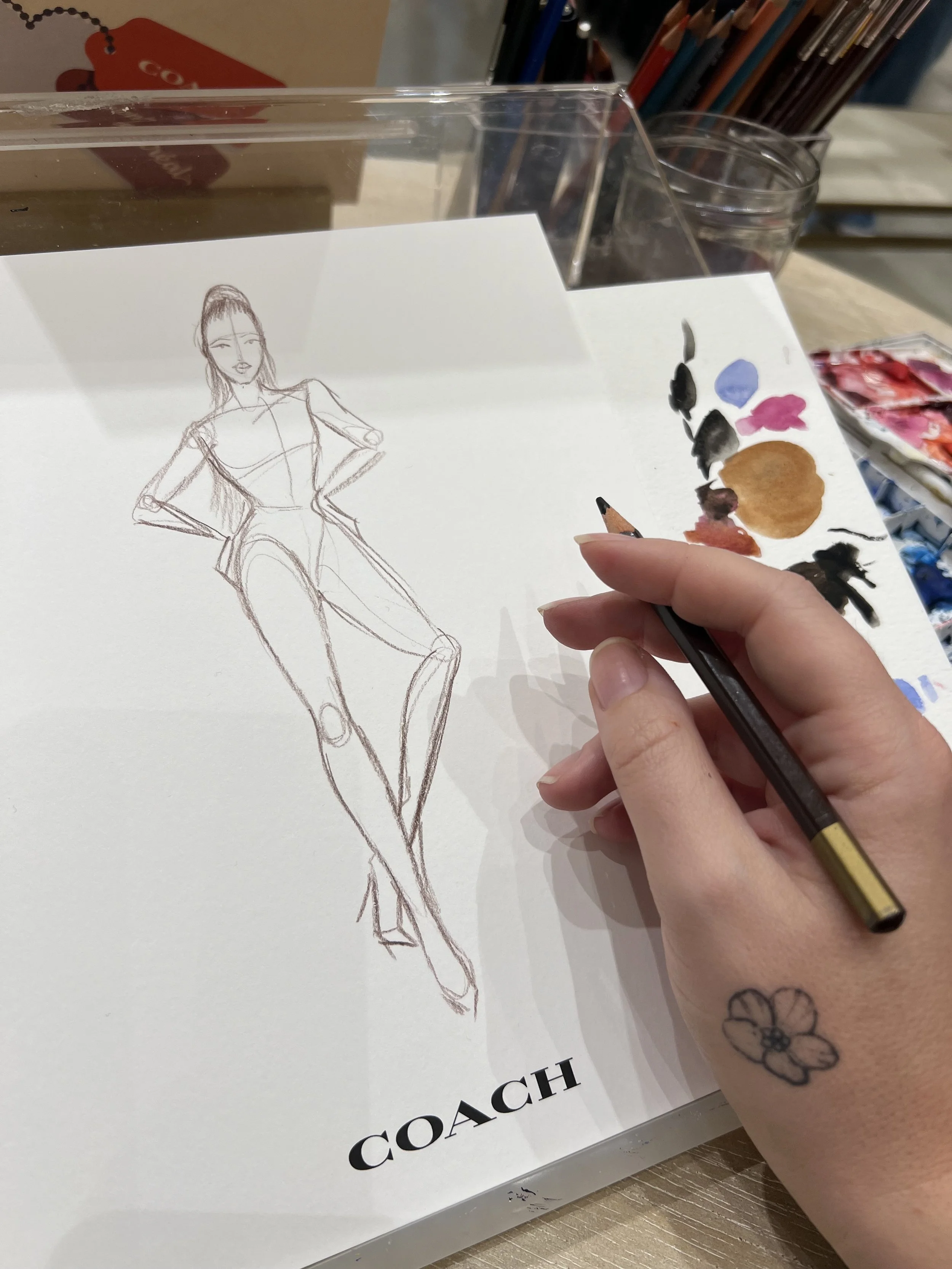 rough-pencil-sketch-outline-for-live-illustration-at-fashion-event.jpeg