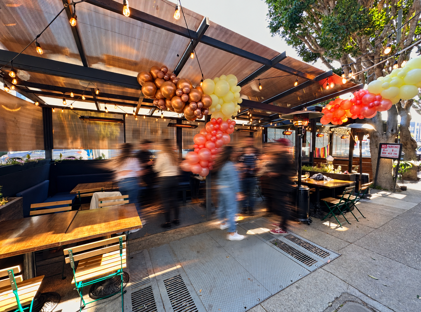 Guests gathered in the Union Parklet, captured with artistic motion blur.