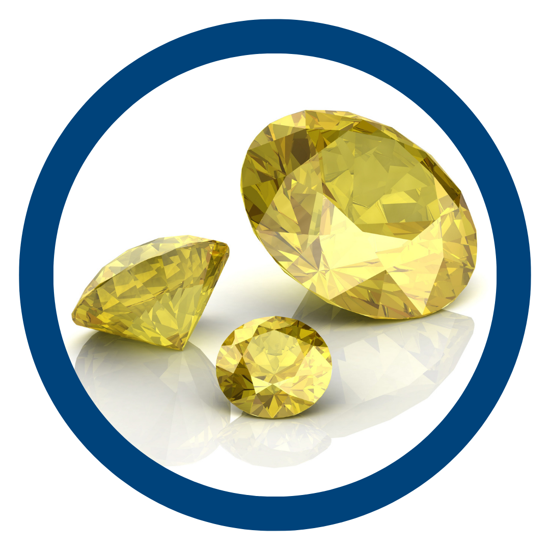 Three yellow sapphire gemstones on a white background