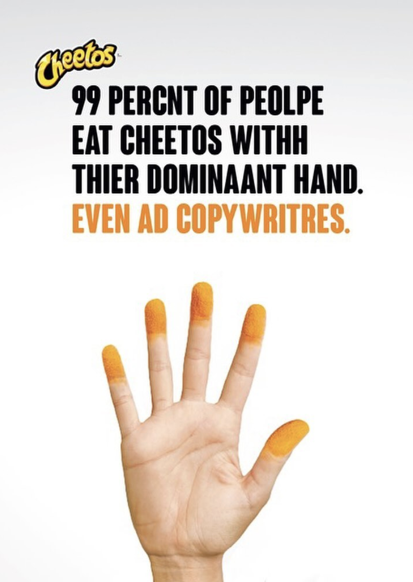 A human hand showing orange (Cheeto dust) fingertips against a white background with the words "99 percnt of peolpe eat Cheetos withh thier dominaant hand. Even ad copywritres" above the photo of the hand. Spelling errors in the text are intentional.