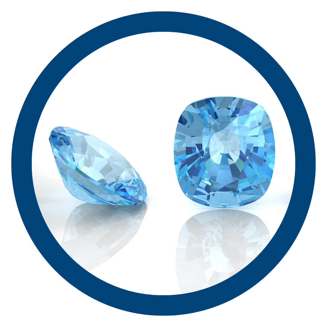 Two blue aquamarine gemstones on a white background