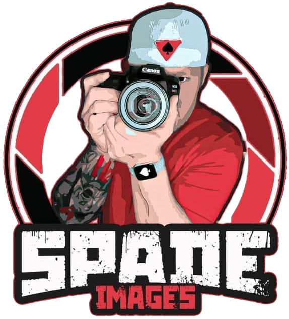 A person with a tattoo sleeve holding a camera and taking a photo, wearing a gray cap with a red and black logo, red shirt, and black wristband. Behind them is a circular background with a red and black design, and the text "SPACE IMAGES" at the bottom.