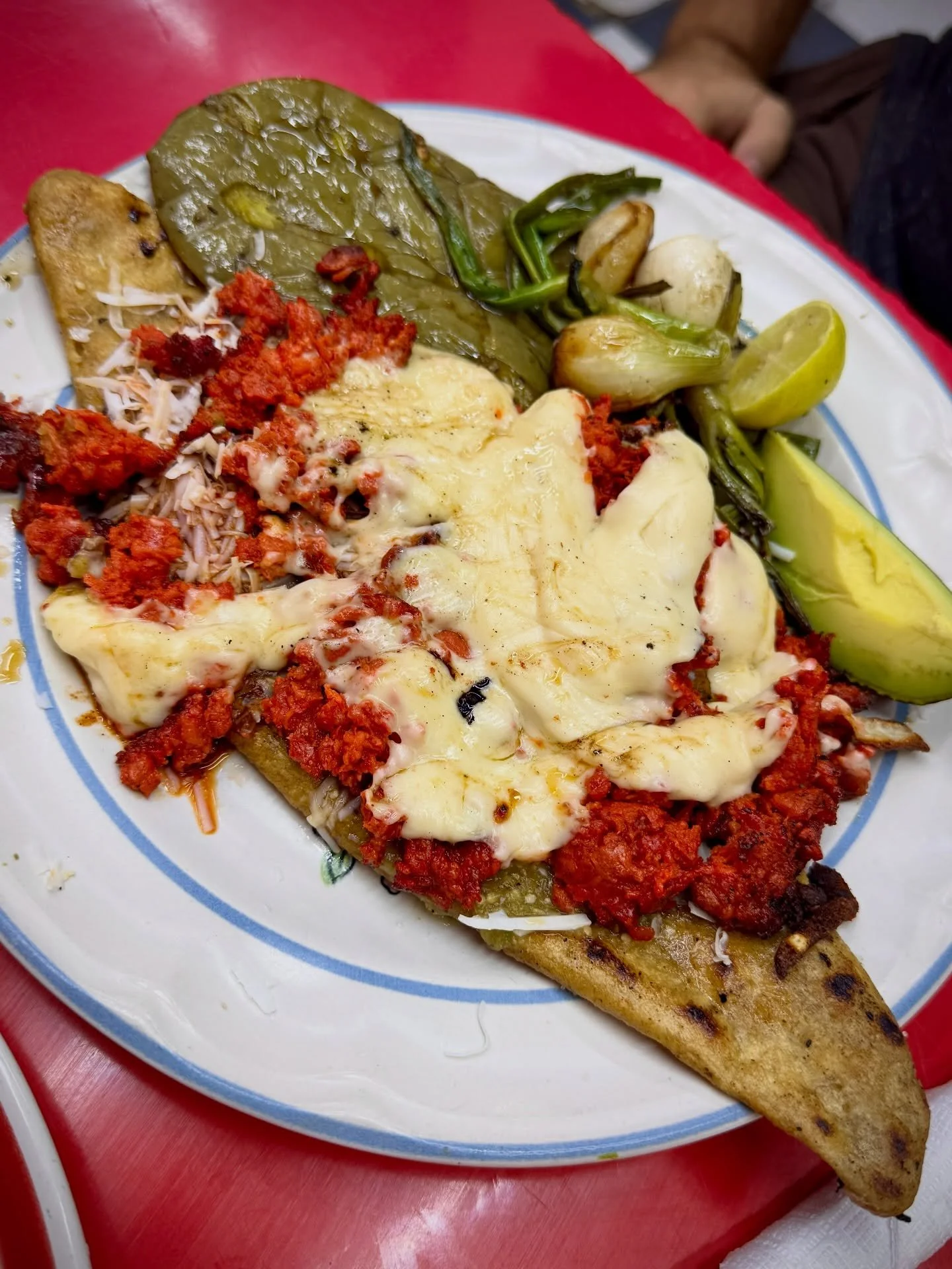 Everyone goes to Mexico City for tacos. Same. I love them. But you really need to try a huarache.

Huarache literally means sandal. The masa is shaped into a long oval, filled with beans, and cooked on a comal or fried until the edges are crisp and t