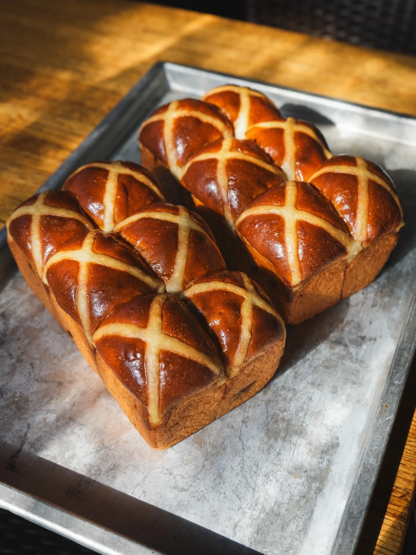 Look what the bakers made for Easter this year 😍💕🐰🐣 These Hot Cross Buns will be available in the market from this evening!! A fluffy spiced brioche loaf with raisins and orange zest 🍞🍊🍇 Yes, it&rsquo;s vegan-friendly 🌱 (contains wheat) They&