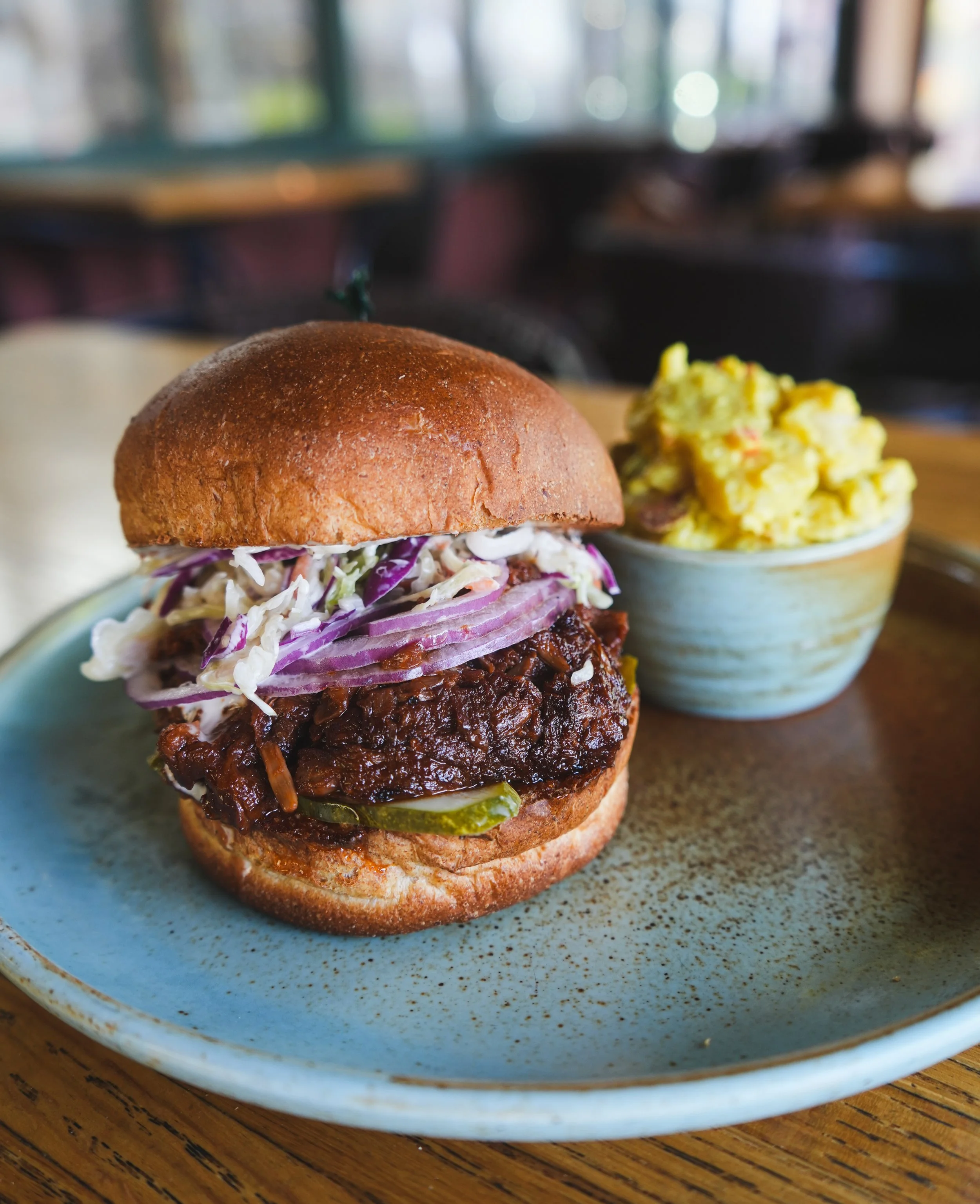 Jackfruit BBQ Burger 😎✌️🇺🇸 Available this FRIDAY (today), SATURDAY &amp; SUNDAY only from 10:30AM to 8PM 🌱 

All made from scratch - BBQ sauce, coleslaw, buns, the side potato salad - everything!

The BBQ jackfruit is down for hours 🤤 The jackfr