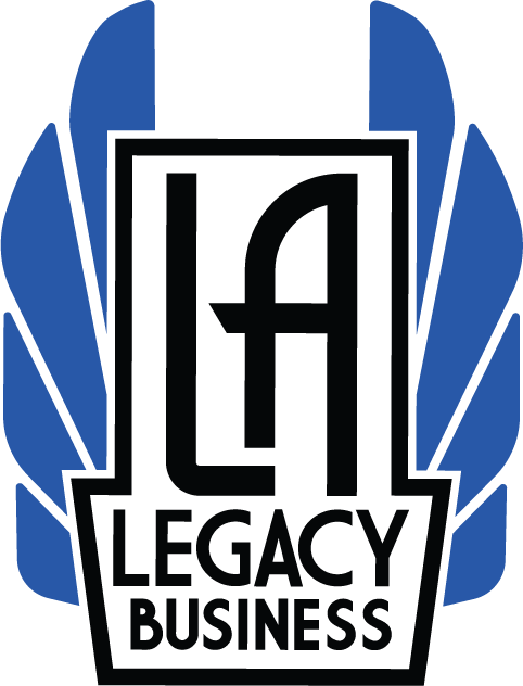 Logo with a shield emblem, blue wings, and the text 'Legacy Business' underneath.