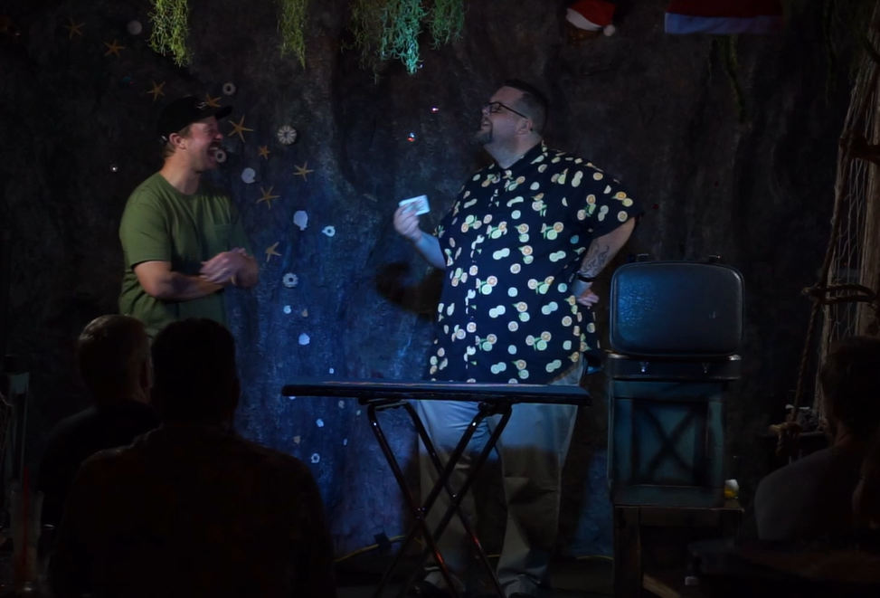 Jeff Walsh performing his comedy magic at a Whiskey and Magic event